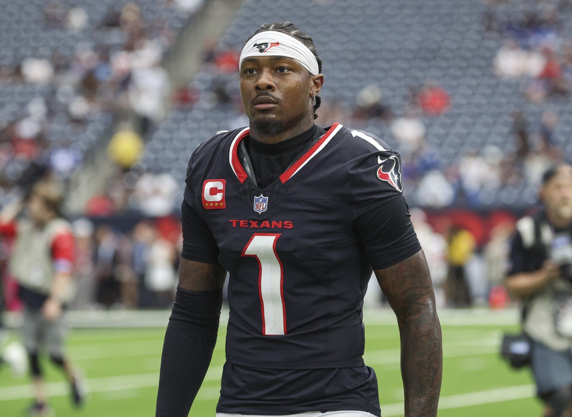 Houston Texans wide receiver Stefon Diggs (1) walks towards the sideline before the game against the Indianapolis Colts at NRG Stadium.