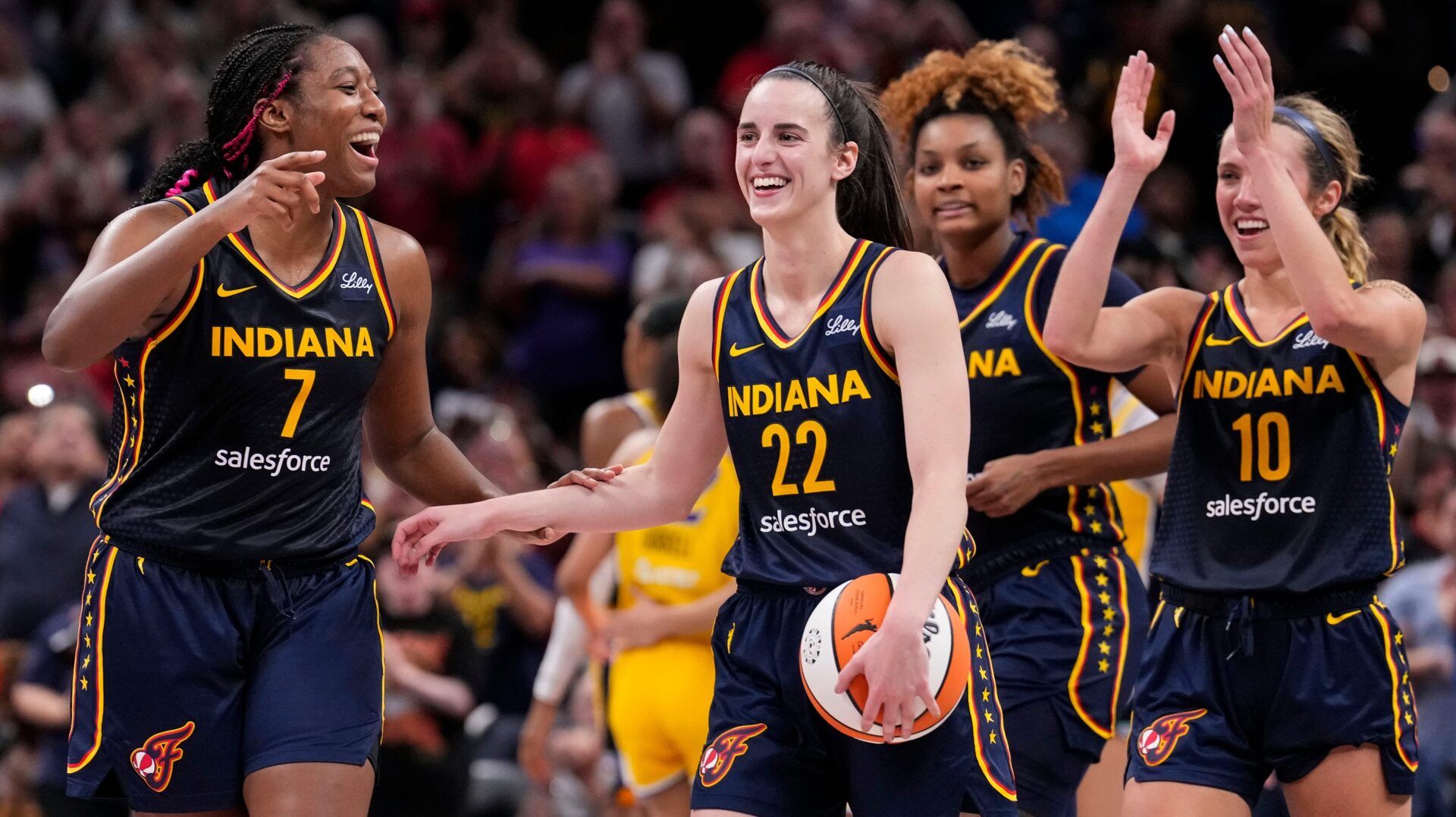 Indiana Fever forward Aliyah Boston (7) celebrates with Indiana Fever guard Caitlin Clark (22) altering recording a triple-double Wednesday, Sept. 4, 2024, during the game at Gainbridge Fieldhouse in Indianapolis. The Indiana Fever defeated the Los Angeles Sparks, 93-86.