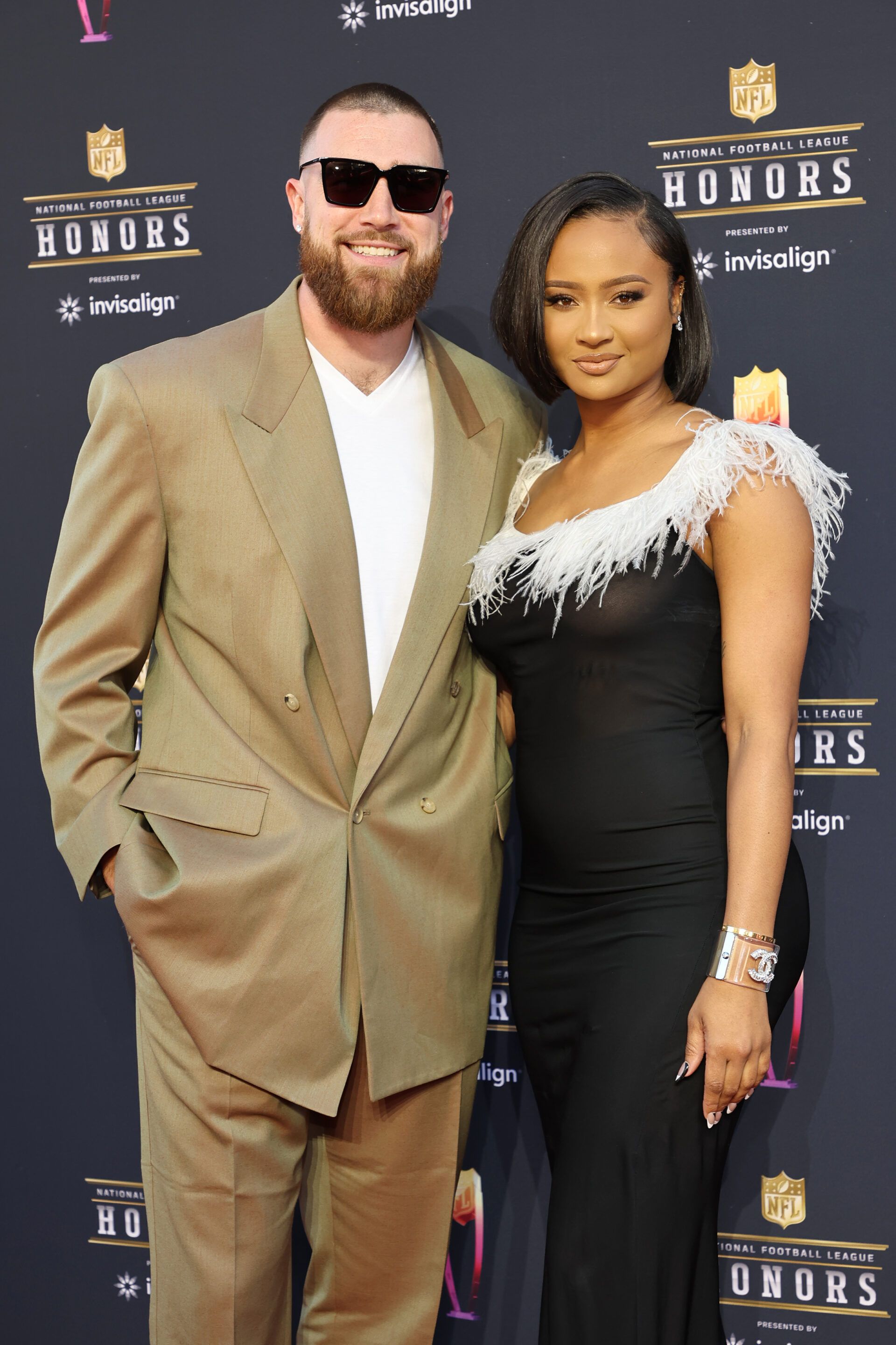 INGLEWOOD, CALIFORNIA - FEBRUARY 10: (L-R) Travis Kelce and Kayla Nicole attend the 11th Annual NFL Honors at YouTube Theater on February 10, 2022 in Inglewood, California. (Photo by Amy Sussman/Getty Images)