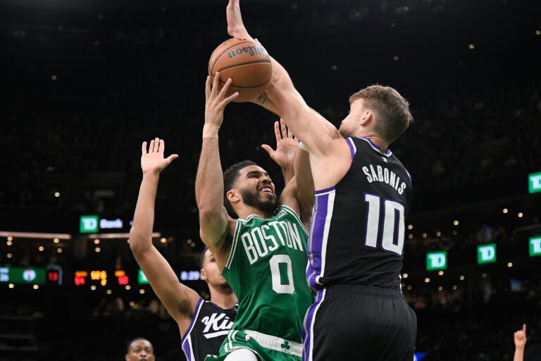 Domantas Sabonis apologized after a Flagrant 1 foul on Jayson Tatum, sparking debate among NBA fans about the play and its aftermath.
