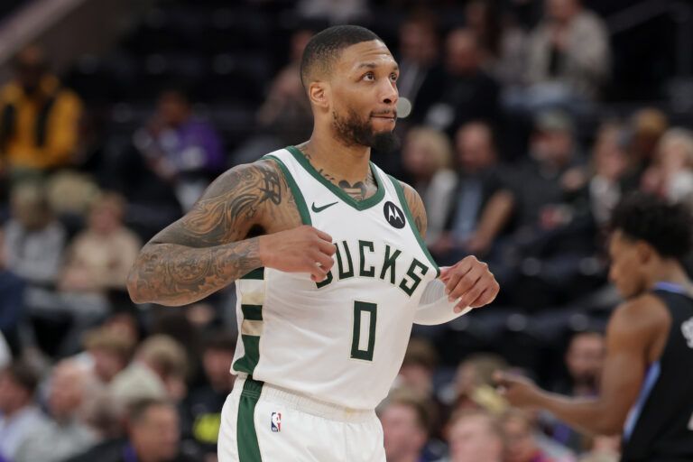 Jan 27, 2025; Salt Lake City, Utah, USA; Milwaukee Bucks guard Damian Lillard (0) reacts in the final seconds of the game against the Utah Jazz at Delta Center. Mandatory Credit: Chris Nicoll-Imagn Images