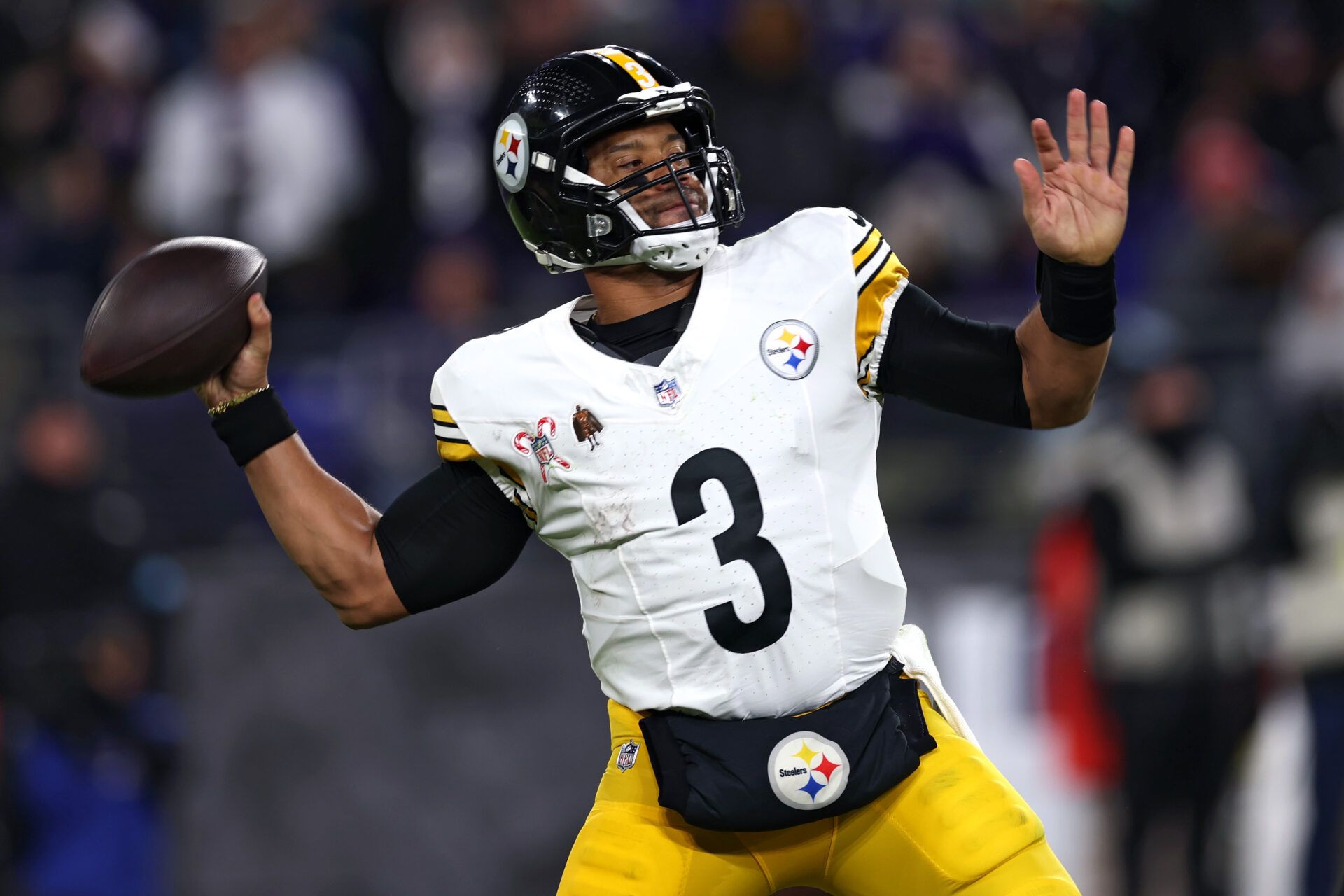 BALTIMORE, MARYLAND - DECEMBER 21: Russell Wilson #3 of the Pittsburgh Steelers throws a pass during the third quarter against the Baltimore Ravens at M&T Bank Stadium on December 21, 2024 in Baltimore, Maryland. (Photo by Rob Carr/Getty Images)