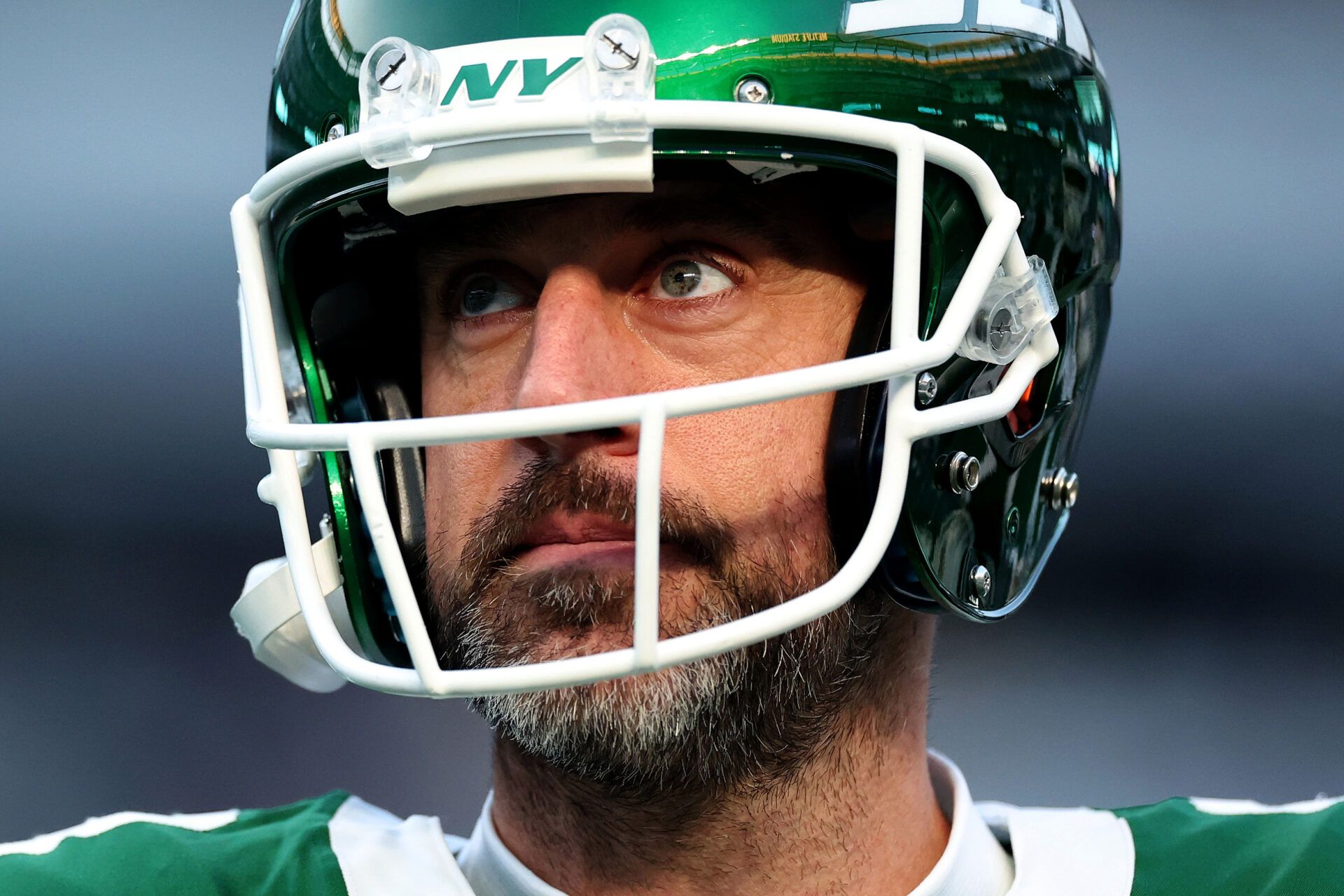 EAST RUTHERFORD, NEW JERSEY - JANUARY 05: Aaron Rodgers #8 of the New York Jets looks on before the game against the Miami Dolphins at MetLife Stadium on January 05, 2025 in East Rutherford, New Jersey. (Photo by Luke Hales/Getty Images)