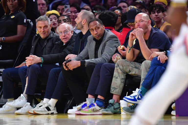 Comedian and writer Larry David and sports media personality Stephen A. Smith attend the game between the Los Angeles Lakers and New York Knicks at Crypto.com Arena.