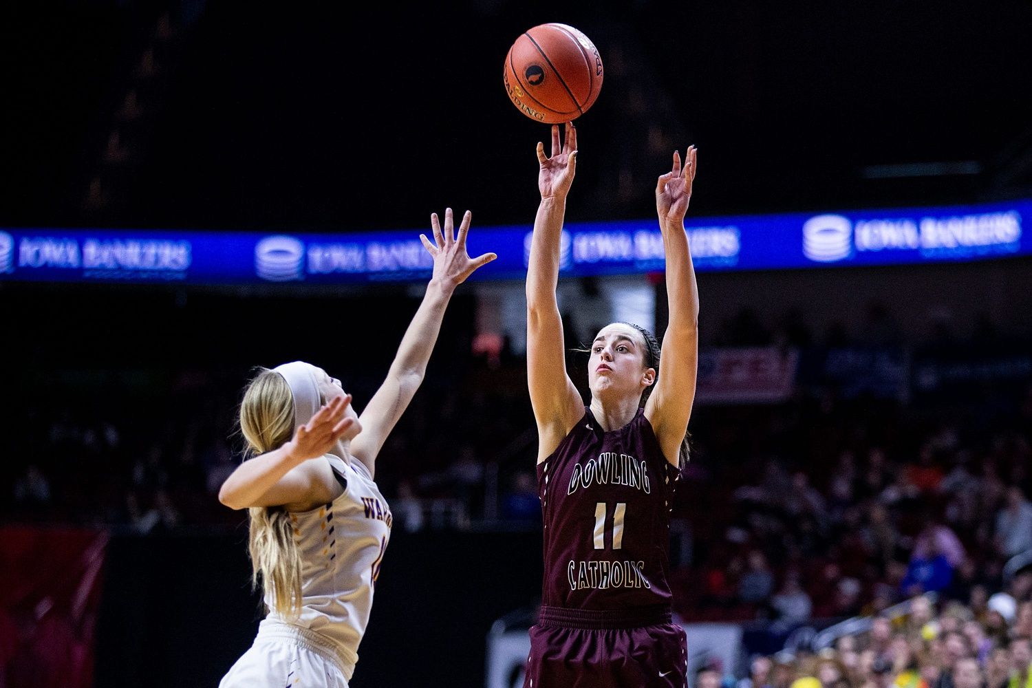 Dowling's Caitlin Clark shoots the ball during the Class 5A Iowa girls' state basketball tournament quarterfinal between Dowling Catholic and Waukee on Monday, Feb. 25, 2019, in Wells Fargo Arena.