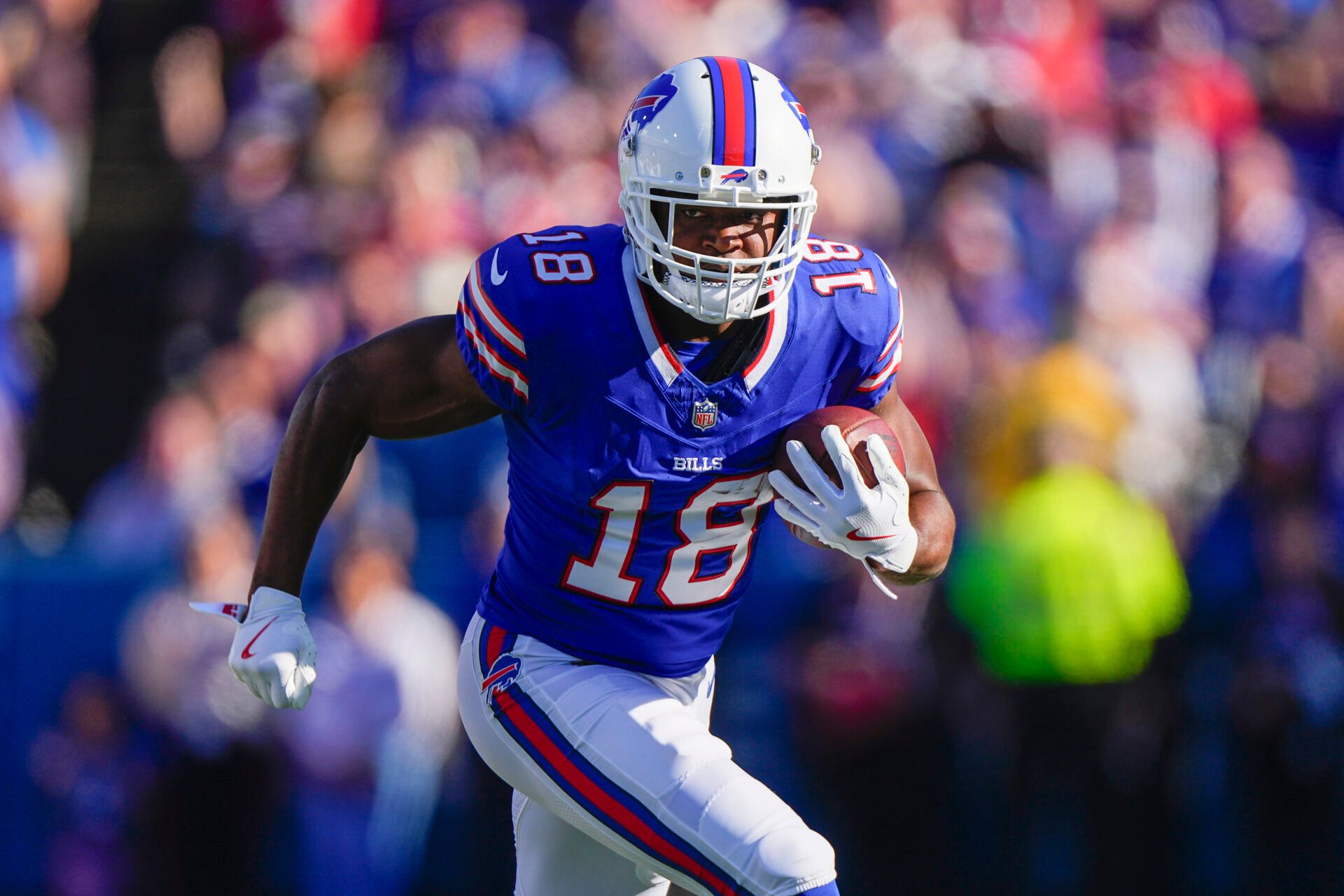Oct 20, 2024; Orchard Park, New York, USA; Buffalo Bills wide receiver Amari Cooper (18) runs with the ball after making a catch against the Tennessee Titans during the second half at Highmark Stadium. Mandatory Credit: Gregory Fisher-Imagn Images