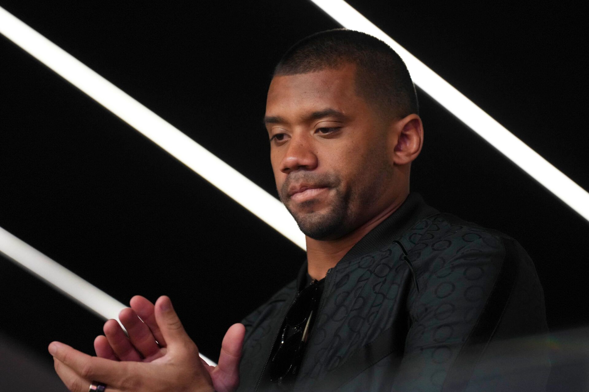Feb 11, 2024; Paradise, Nevada, USA; Denver Broncos quarterback Russell Wilson watches play during the third quarter of Super Bowl LVIII between Kansas City Chiefs and San Francisco 49ers at Allegiant Stadium. Mandatory Credit: Joe Camporeale-USA TODAY Sports