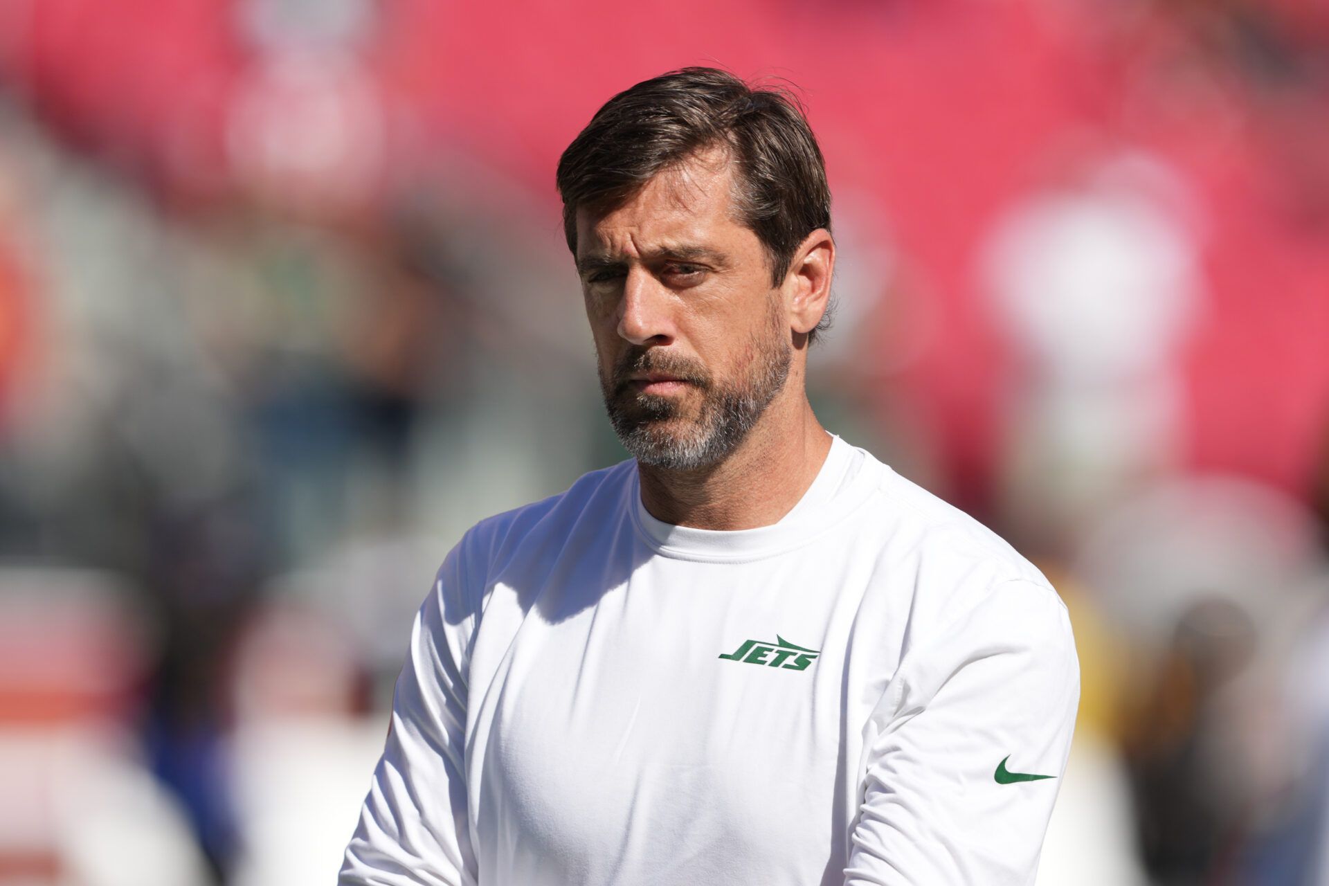 Sep 9, 2024; Santa Clara, California, USA; New York Jets quarterback Aaron Rodgers (8) stands on the field before the game against the San Francisco 49ers at Levi's Stadium. Mandatory Credit: Darren Yamashita-Imagn Images