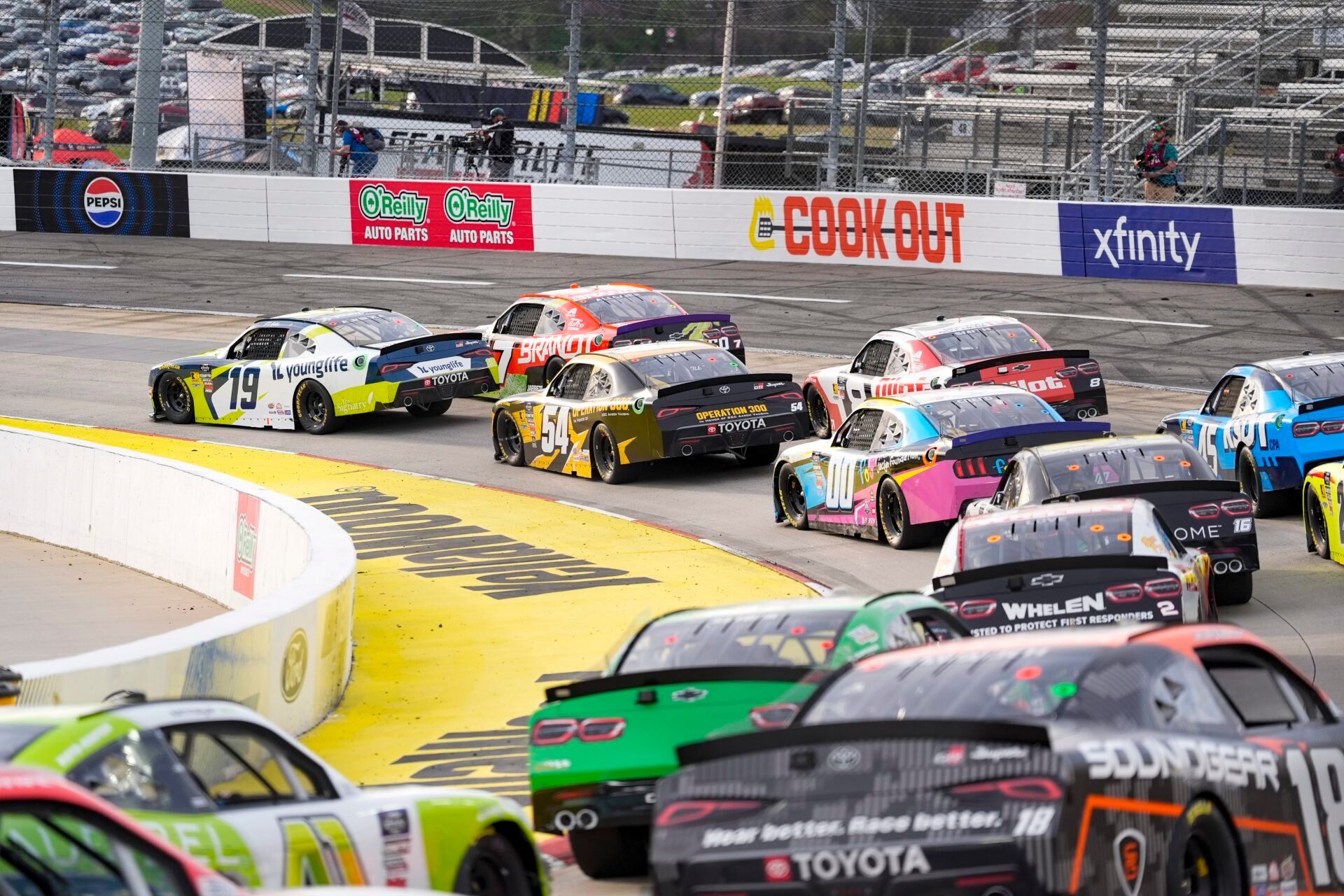 Fans and drivers blasted the chaotic NASCAR Xfinity Series race at Martinsville, featuring 14 cautions and a controversial final lap crash.