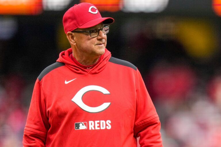 Cincinnati Reds manager Terry Francona (77) returns to the dugout after making a pitching change in the top of the ninth inning of the MLB Opening Day game between the Cincinnati Reds and the San Francisco Giants at Great American Ball Park in downtown Cincinnati on Thursday, March 27, 2025. The Giants won 6-4.