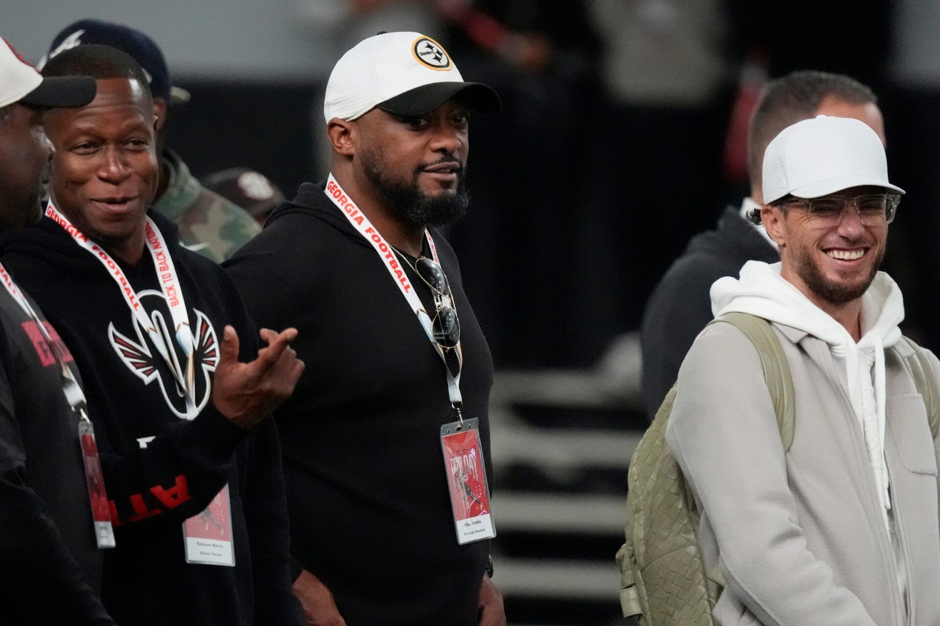 Atlanta Falcons head coach Raheem Morris, Pittsburgh Steelers head coach Mike Tomlin and Miami Dolphins head coach Mike McDaniel watch UGA Footballs Pro Day in Athens, Ga., on Wednesday, March 12, 2025. Representatives from all 32 NFL teams are on hand to watch former UGA football players in action.