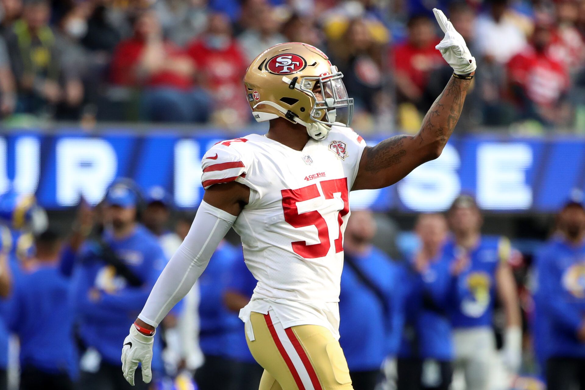 INGLEWOOD, CALIFORNIA - JANUARY 09: Dre Greenlaw #57 of the San Francisco 49ers reacts in the second quarter of the game against the Los Angeles Rams at SoFi Stadium on January 09, 2022 in Inglewood, California. (Photo by Katelyn Mulcahy/Getty Images)