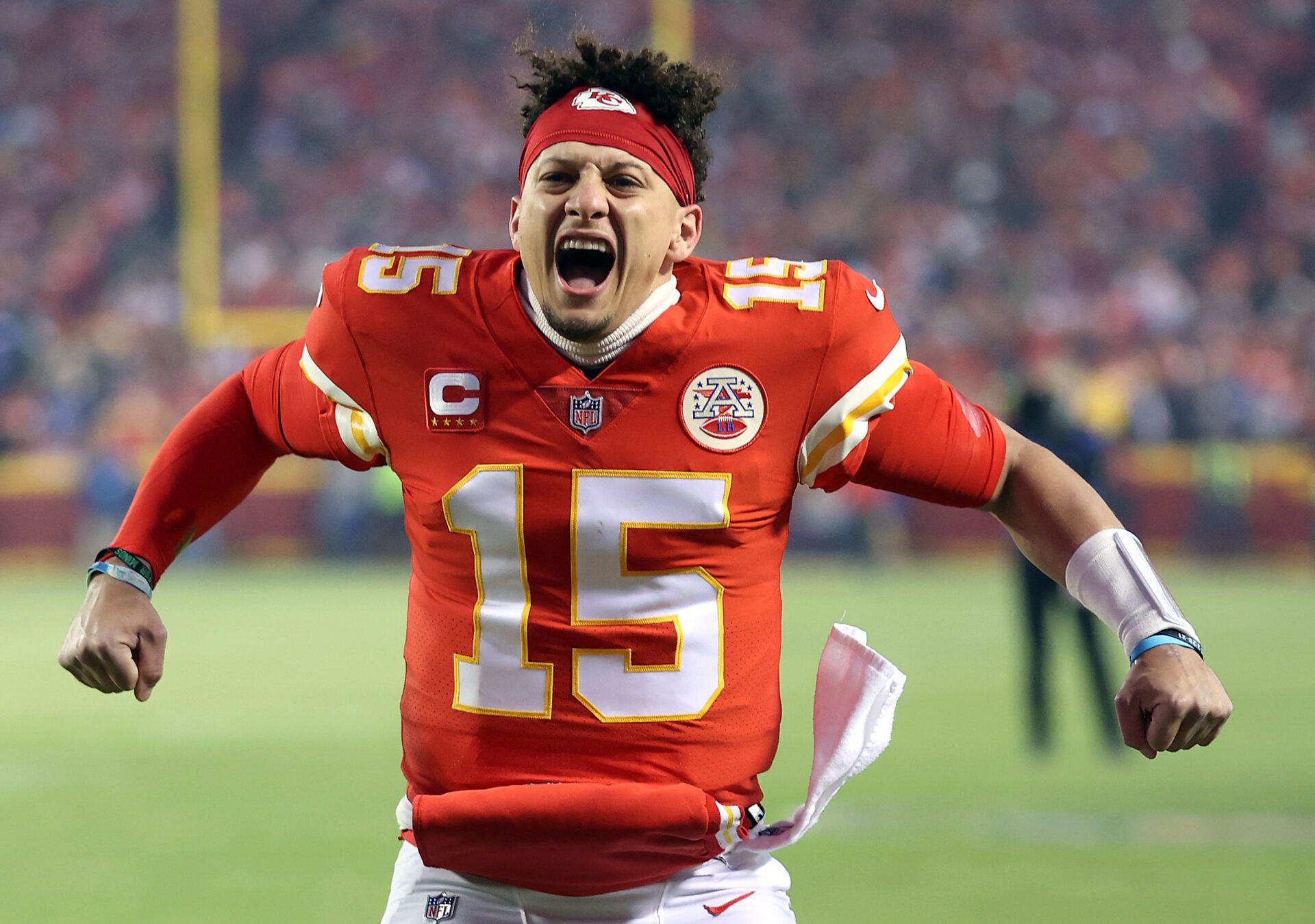 KANSAS CITY, MISSOURI - JANUARY 23: Patrick Mahomes #15 of the Kansas City Chiefs pumps up the crowd prior to the AFC Divisional Playoff game against the Buffalo Bills at Arrowhead Stadium on January 23, 2022 in Kansas City, Missouri. (Photo by Jamie Squire/Getty Images)