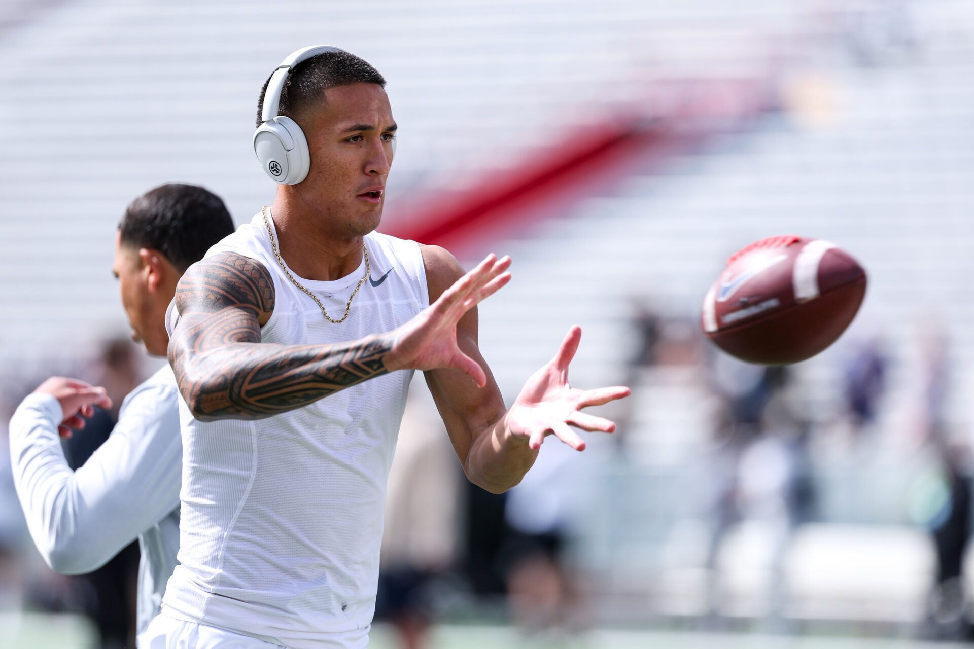 Oct 19, 2024; Tucson, Arizona, USA; Arizona Wildcats wide receiver Tetairoa McMillan (4) warms up before game against Colorado Buffaloes at Arizona Stadium. Mandatory Credit: Aryanna Frank-Imagn Images