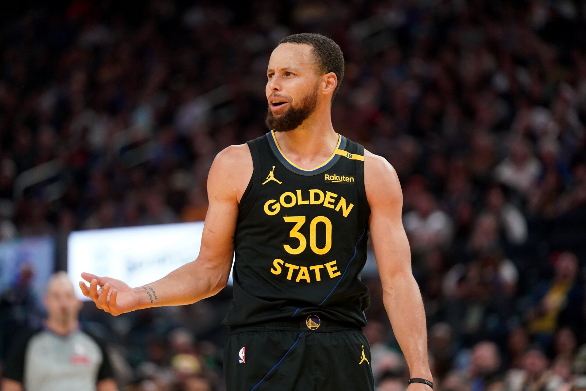 Feb 25, 2025; San Francisco, California, USA; Golden State Warriors guard Stephen Curry (30) reacts after being called for a foul against the Charlotte Hornets in the third quarter at the Chase Center. Mandatory Credit: Cary Edmondson-Imagn Images