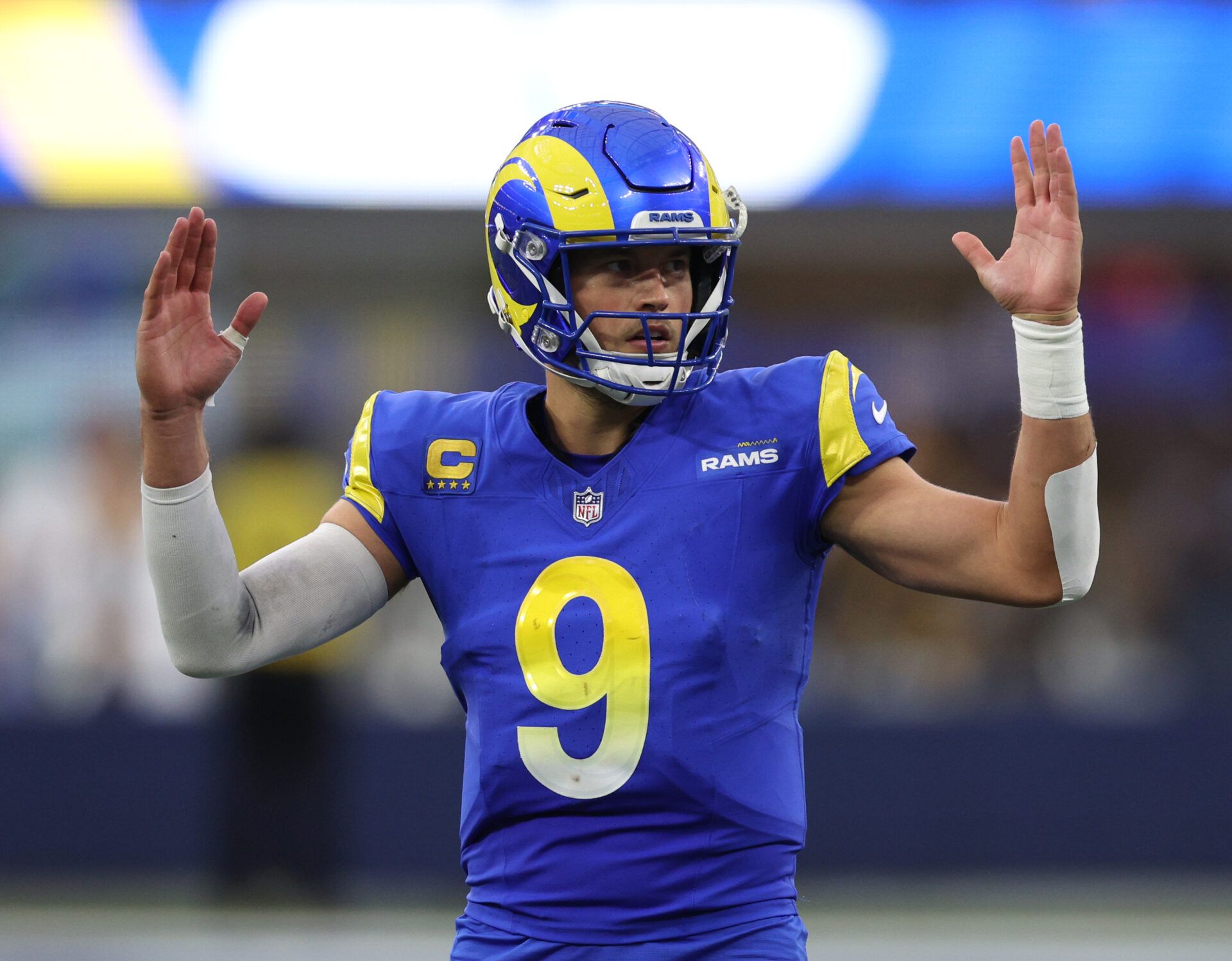 INGLEWOOD, CALIFORNIA - DECEMBER 17: Matthew Stafford #9 of the Los Angeles Rams reacts to his touchdown pass during a 28-20 win over the Washington Commanders at SoFi Stadium on December 17, 2023 in Inglewood, California. (Photo by Harry How/Getty Images)