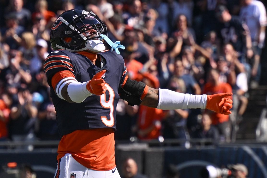 Chicago Bears safety Jaquan Brisker (9) celebrates a defensive stop against the Carolina Panthers during the first quarter at Soldier Field.