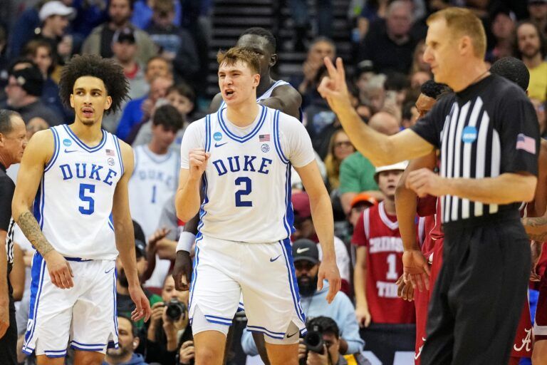 Duke Blue Devils forward Cooper Flagg (2) celebrates after a play during the first half against the Alabama Crimson Tide in the East Regional final of the 2025 NCAA tournament at Prudential Center.