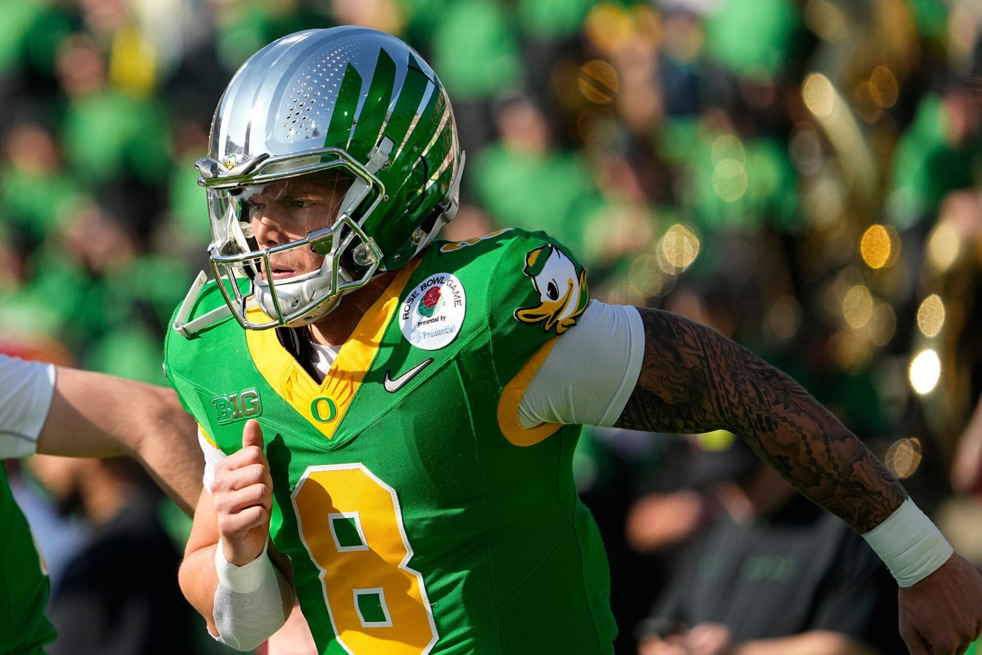 Oregon Ducks quarterback Dillon Gabriel (8) warms up prior to the College Football Playoff quarterfinal against the Ohio State Buckeyes at the Rose Bowl in Pasadena, Calif. on Jan. 1, 2025.