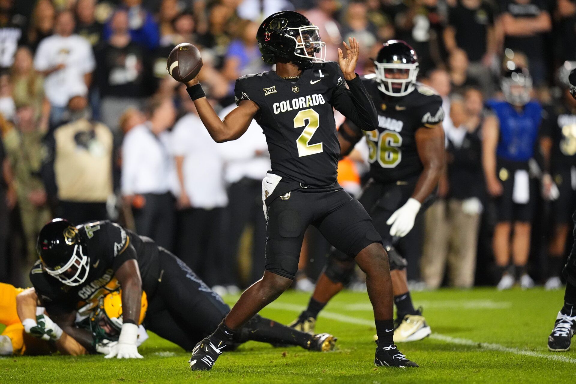 Colorado Buffaloes quarterback Shedeur Sanders (2) prepares to pass the ball in the second half against the North Dakota State Bison at Folsom Field.