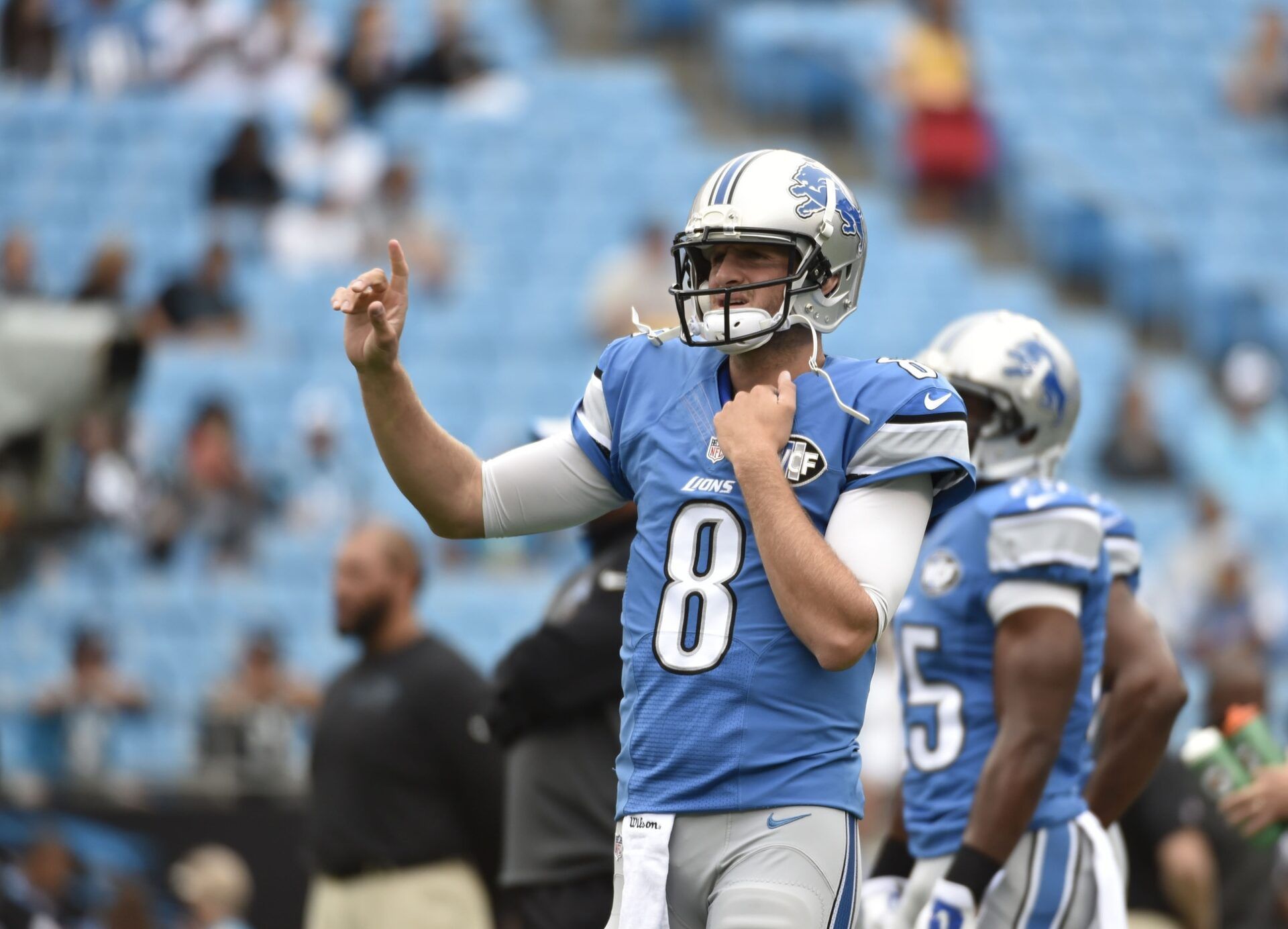 Detroit Lions quarterback Dan Orlovsky (8) before the game at Bank of America Stadium.