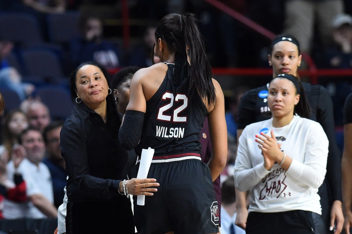 South Carolina Gamecocks head coach Dawn Staley greets forward A'ja Wilson (22) on the sidelines after being taken out of the game against the Connecticut Huskies during the second half in the championship game of the Albany regional of the women's basketball 2018 NCAA Tournament at the Times Union Center.