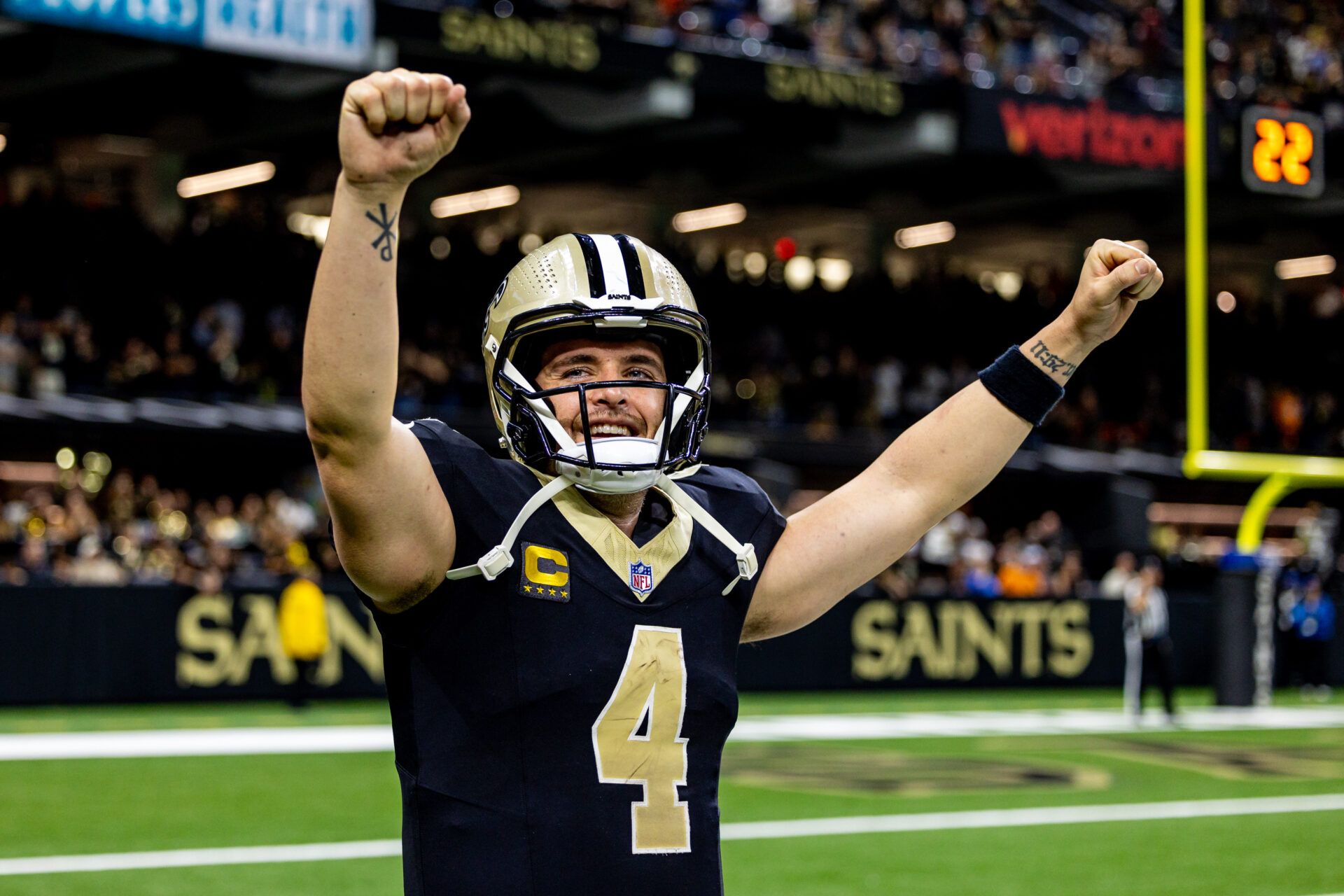 Nov 17, 2024; New Orleans, Louisiana, USA; New Orleans Saints quarterback Derek Carr (4) reacts after tight end Taysom Hill (not pictured) scores a touchdown against the Cleveland Browns during the second half at Caesars Superdome. Mandatory Credit: Stephen Lew-Imagn Images