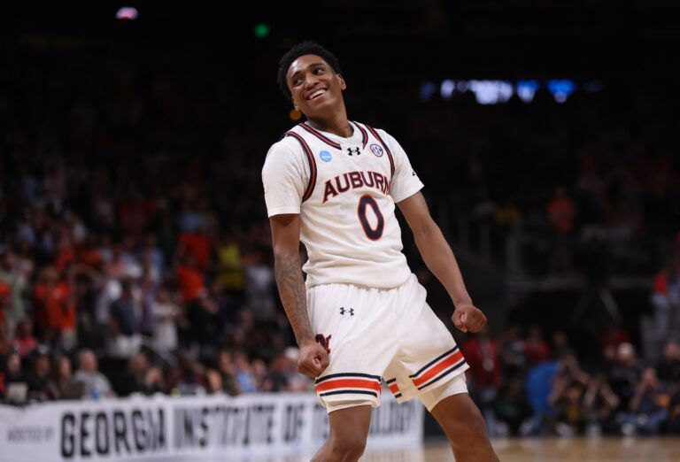 Auburn Tigers guard Tahaad Pettiford (0) celebrates after a basket in the second half of a South Regional semifinal of the 2025 NCAA tournament against the Michigan Wolverines at State Farm Arena.