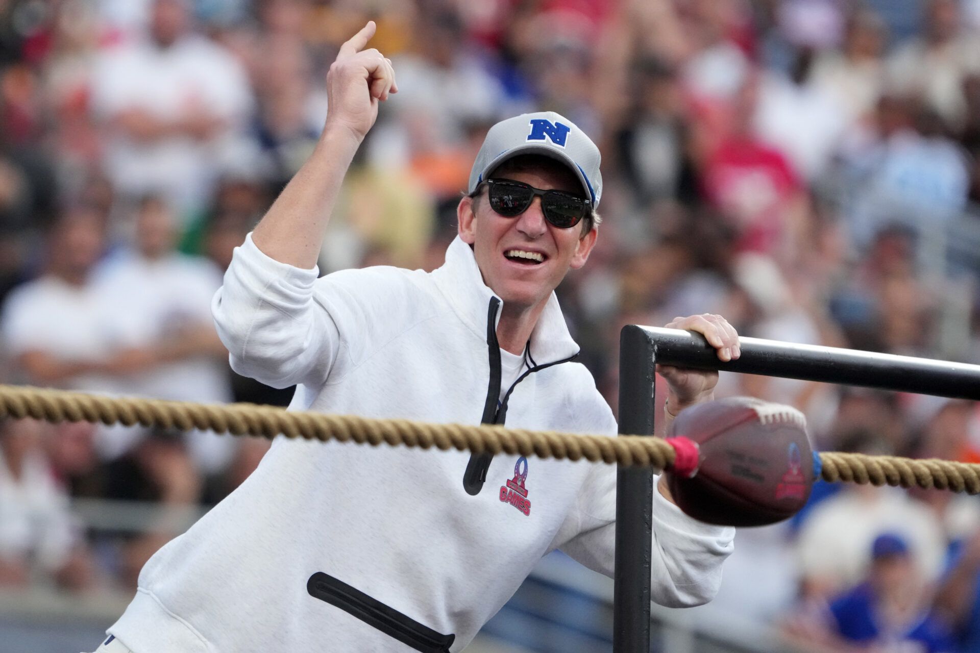 Feb 2, 2025; Orlando, FL, USA; NFC coach Eli Manning reacts during the Tug of War event at the 2025 Pro Bowl Games at Camping World Stadium. Mandatory Credit: Kirby Lee-Imagn Images