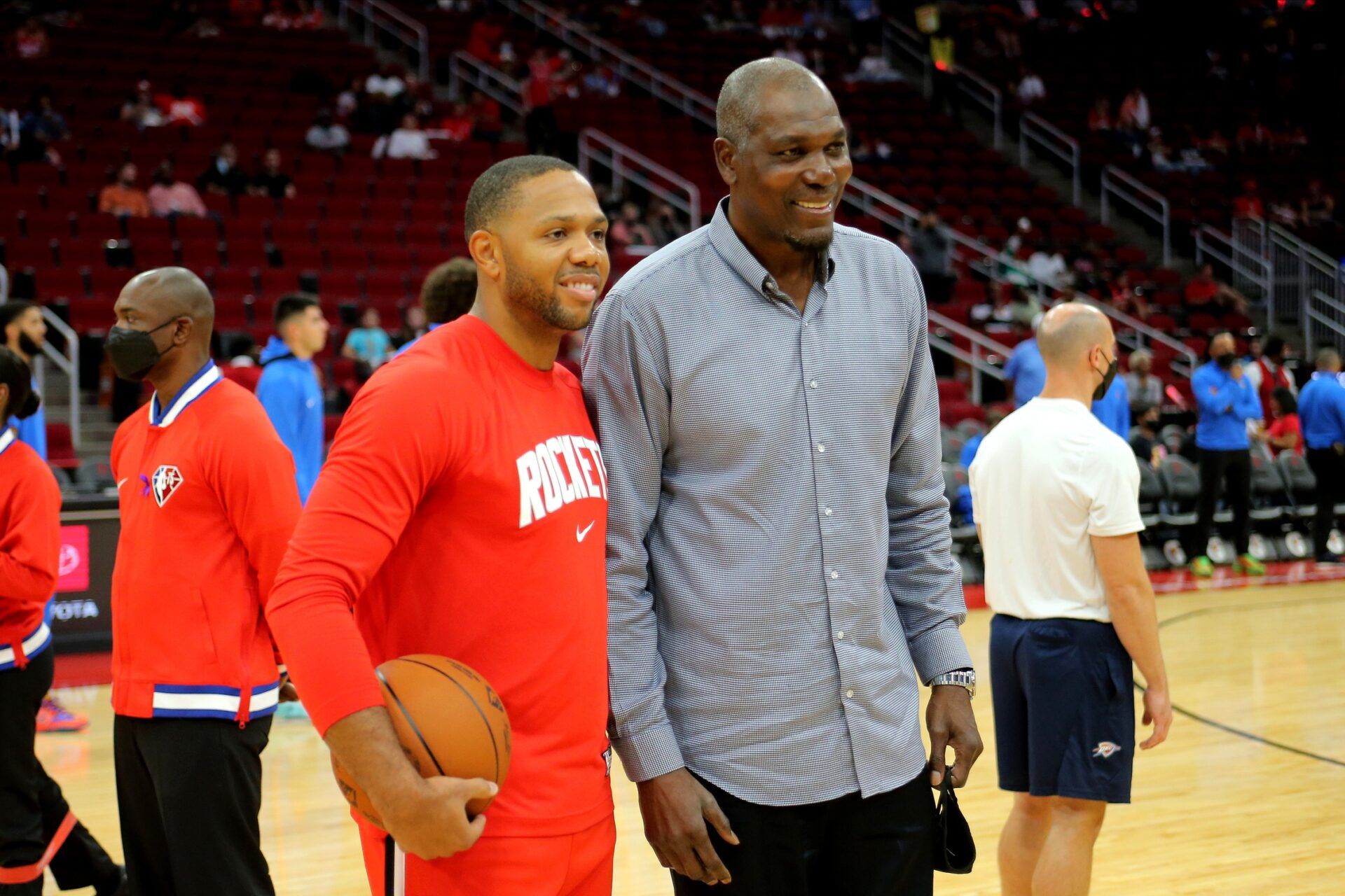 Houston Rockets guard Eric Gordon (10, left) and former Houston Rockets center and basketball Hall-of-Famer Hakeem Olajuwon pose for a photo prior to the game against the Oklahoma City Thunder at Toyota Center.