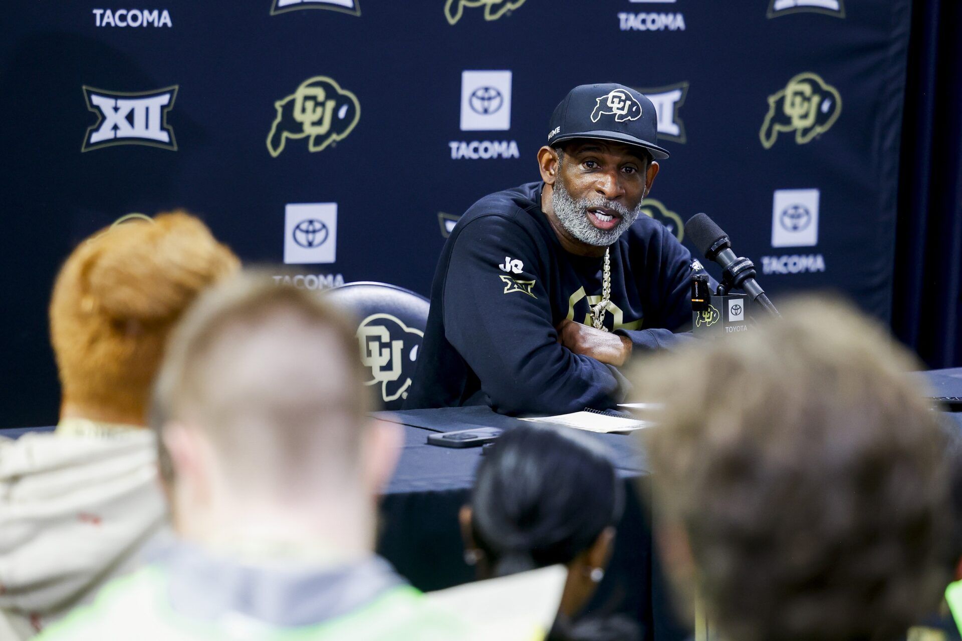 Colorado Buffaloes head coach Deion Sanders speaks to the media at the University of Colorado NFL Showcase at the CU Indoor Practice Facility.