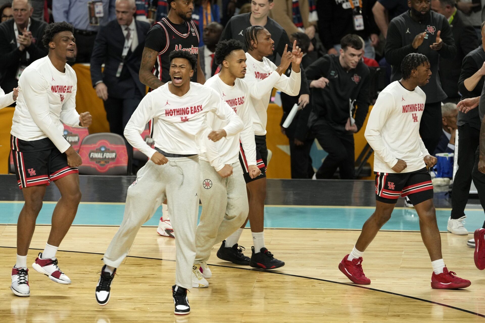The Houston Cougars bench reacts against the Duke Blue Devils during the second half in the semifinals of the men's Final Four of the 2025 NCAA Tournament at Alamodome.