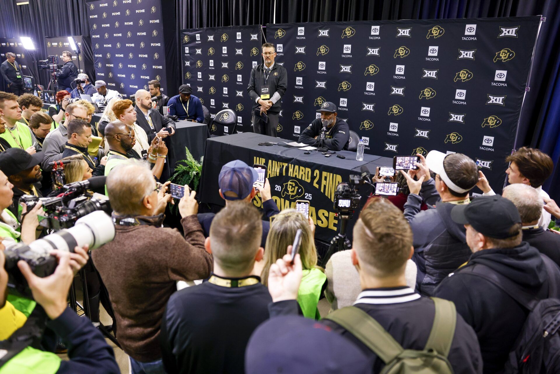 Colorado Buffaloes head coach Deion Sanders speaks to the media at the University of Colorado NFL Showcase at the CU Indoor Practice Facility.