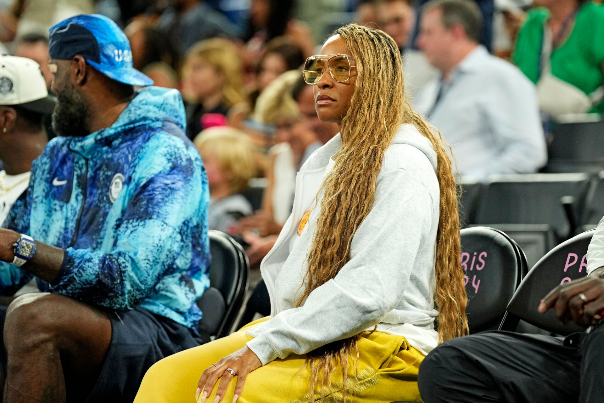 Aug 7, 2024; Paris, France; Savannah James, wife of Lebron James, sits court side before the game between the United States and Nigeria in the women’s basketball quarterfinals during the Paris 2024 Olympic Summer Games at Accor Arena. Mandatory Credit: Kyle Terada-USA TODAY Sports