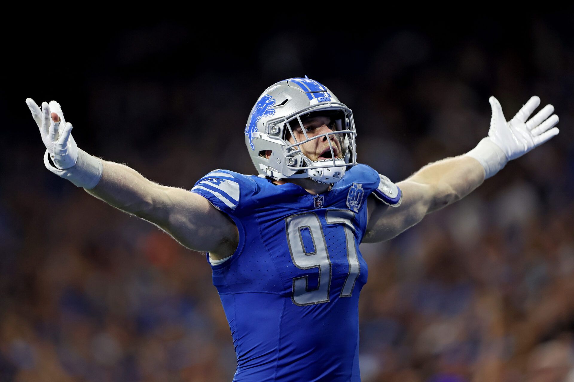 DETROIT, MICHIGAN - SEPTEMBER 17: Aidan Hutchinson #97 of the Detroit Lions reacts after a play during the fourth quarter in the game against the Seattle Seahawks at Ford Field on September 17, 2023 in Detroit, Michigan. (Photo by Rey Del Rio/Getty Images)