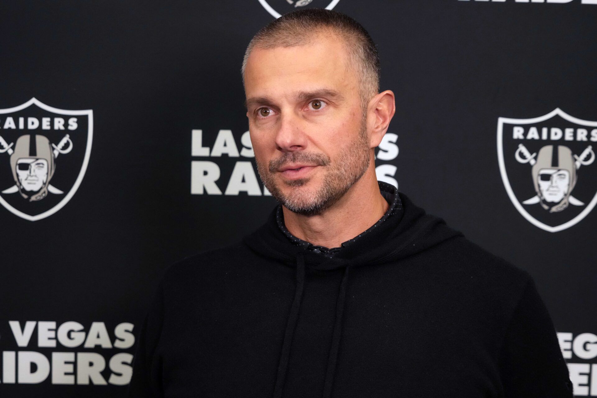 Feb 25, 2025; Indianapolis, IN, USA; Las Vegas Raiders general manager John Spytek on radio row during the NFL Scouting Combine at the Indiana Convention Center. Mandatory Credit: Kirby Lee-Imagn Images