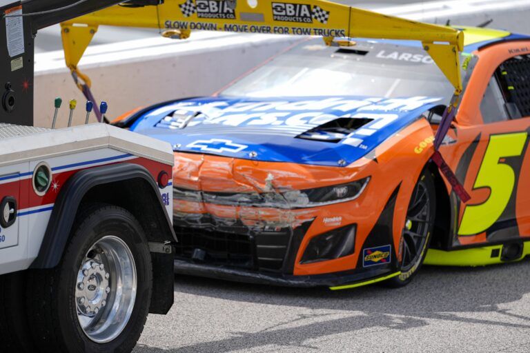 NASCAR Cup Series driver Kyle Larson (5) spins early in turn two and is brought in to the garage for work during the Goodyear 400 at Darlington Raceway.