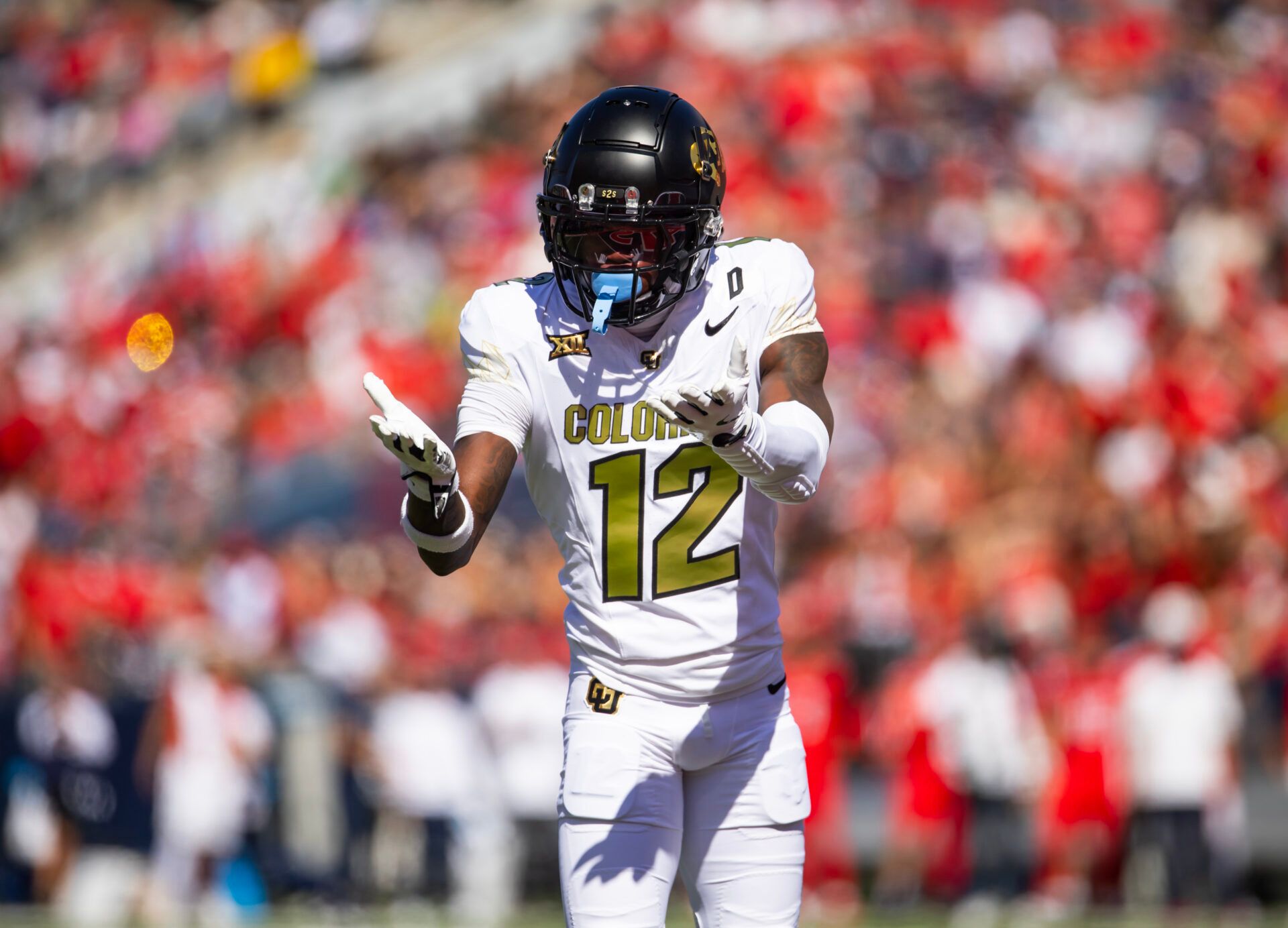 Oct 19, 2024; Tucson, Arizona, USA; Colorado Buffalos wide receiver Travis Hunter (12) reacts against the Arizona Wildcats in the first half at Arizona Stadium. Mandatory Credit: Mark J. Rebilas-Imagn Images