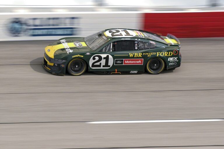 NASCAR Cup Series driver Josh Berry (21) out of turn one during the Goodyear 400 at Darlington Raceway.