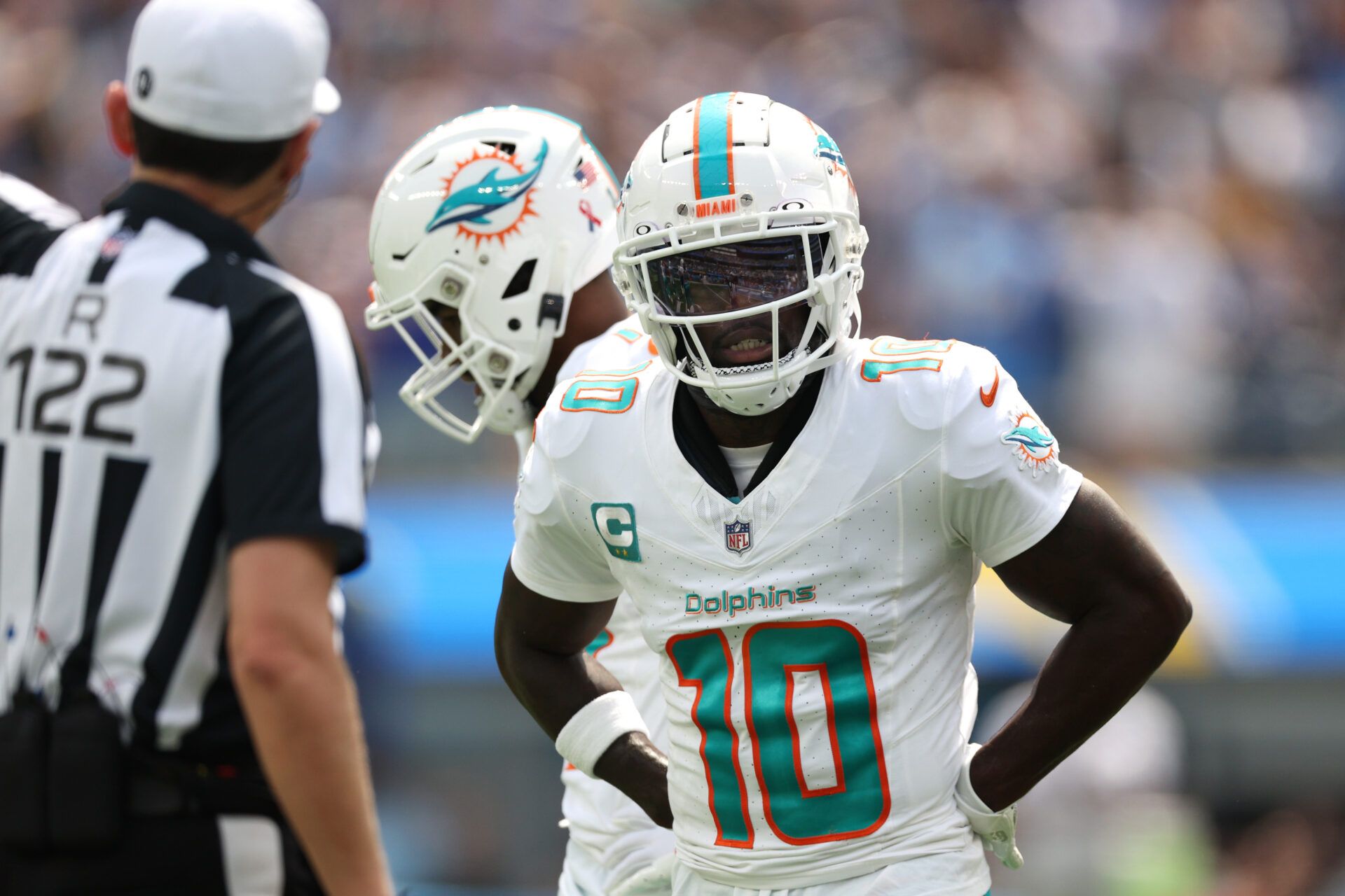 INGLEWOOD, CALIFORNIA - SEPTEMBER 10: Tyreek Hill #10 of the Miami Dolphins reacts after a fumble in the first quarter of a game against the Los Angeles Chargers at SoFi Stadium on September 10, 2023 in Inglewood, California. (Photo by Harry How/Getty Images)