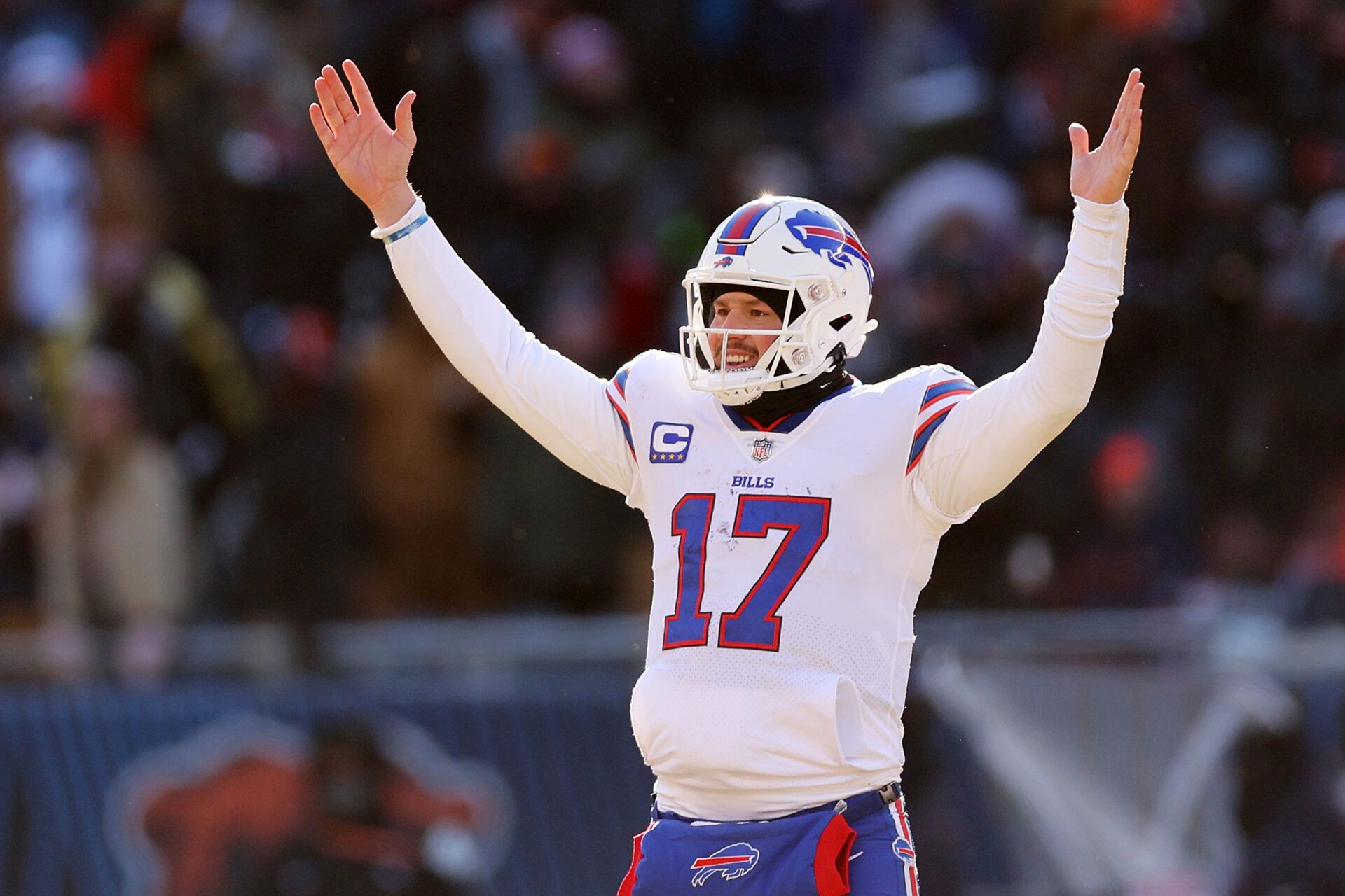 CHICAGO, ILLINOIS - DECEMBER 24: Josh Allen #17 of the Buffalo Bills celebrates a touchdown against the Chicago Bears during the third quarter at Soldier Field on December 24, 2022 in Chicago, Illinois. (Photo by Michael Reaves/Getty Images)