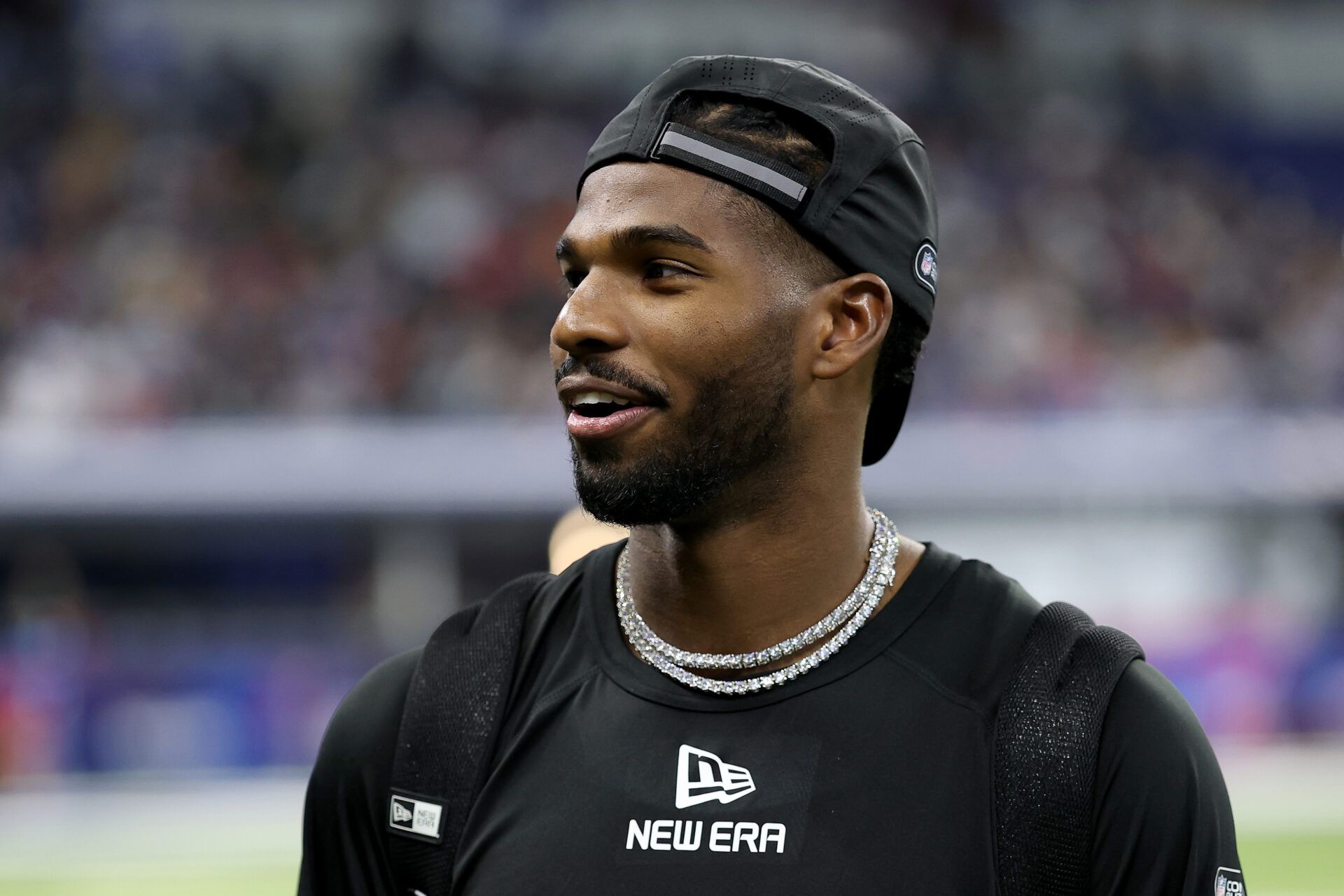 INDIANAPOLIS, INDIANA - MARCH 01: Shedeur Sanders #QB13 of Colorado looks on during the NFL Scouting Combine at Lucas Oil Stadium on March 01, 2025 in Indianapolis, Indiana. (Photo by Stacy Revere/Getty Images)