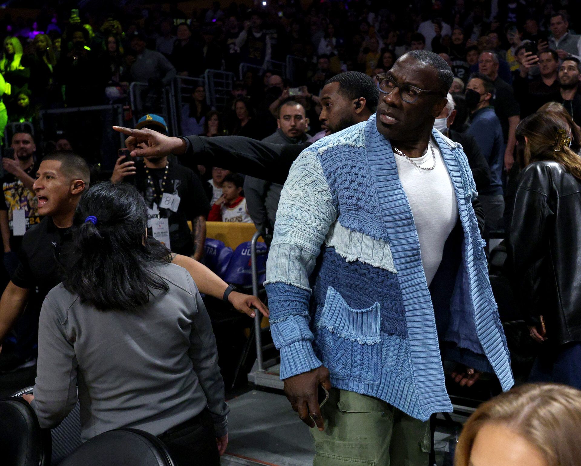 LOS ANGELES, CALIFORNIA - JANUARY 20: Shannon Sharpe reacts after he is restrained by security from Ja Morant #12 of the Memphis Grizzlies after a verbal altercation after the first half against the Los Angeles Lakers at Crypto.com Arena on January 20, 2023 in Los Angeles, California. (Photo by Harry How/Getty Images) NOTE TO USER: User expressly acknowledges and agrees that, by downloading and/or using this photograph, user is consenting to the terms and conditions of the Getty Images License Agreement.