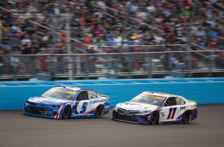 NASCAR Cup Series driver Kyle Larson (5) leads Denny Hamlin (11) during the NASCAR Cup Series Championship at Phoenix Raceway.