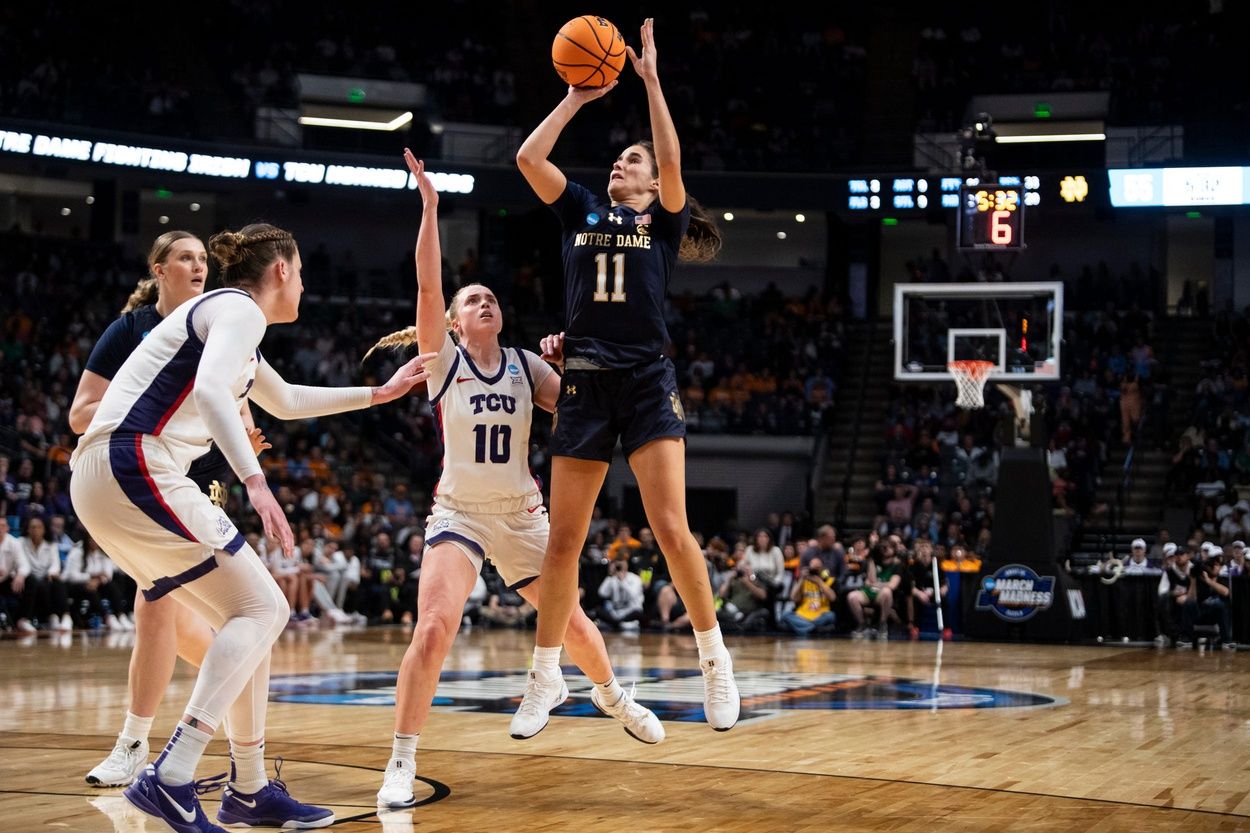 Notre Dame Fighting Irish guard Sonia Citron (11) takes a jump shot as TCU Horned Frogs face off with Notre Dame Fighting Irish during the Sweet 16 at Legacy Arena in Birmingham, Ala., on Saturday, March 29, 2025. TCU Horned Frogs defeated Notre Dame Fighting Irish 71-62 to advance to the Elite 8.
