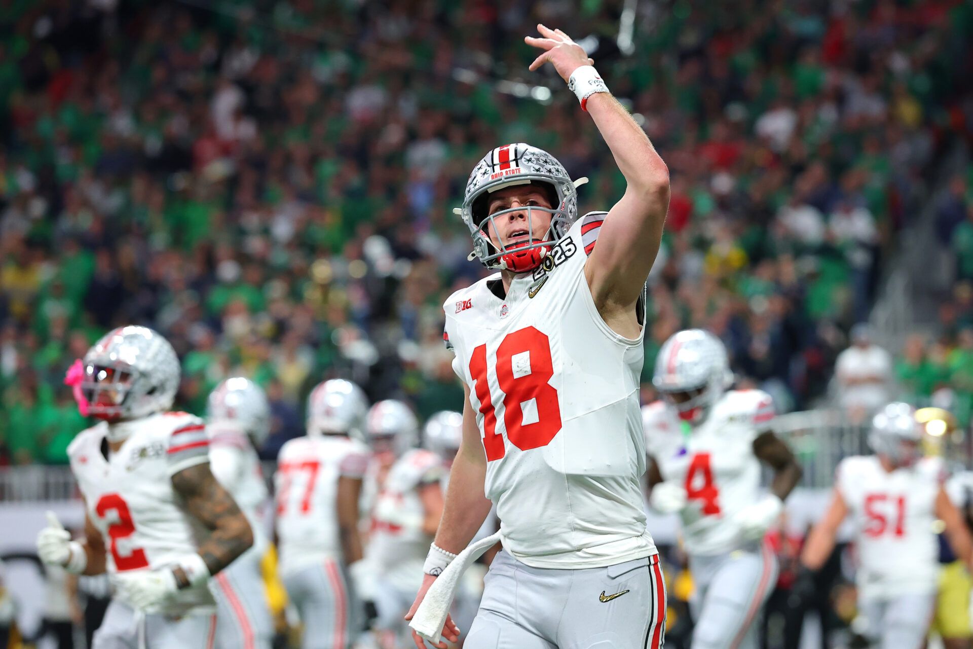ATLANTA, GEORGIA - JANUARY 20: Will Howard #18 of the Ohio State Buckeyes reacts after a second quarter touchdown against the Notre Dame Fighting Irish in the 2025 CFP National Championship at the Mercedes-Benz Stadium on January 20, 2025 in Atlanta, Georgia. (Photo by Kevin C. Cox/Getty Images)