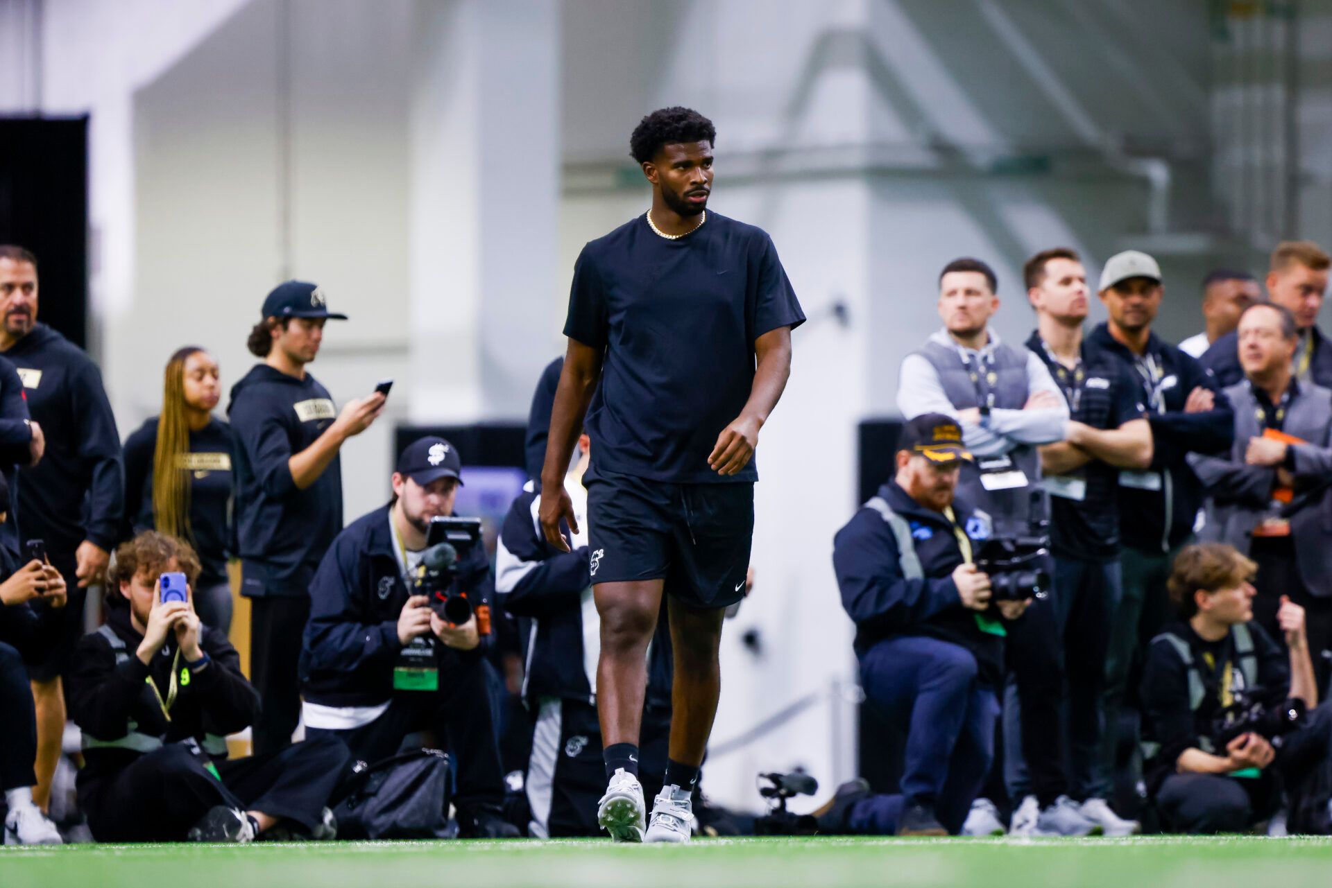 Apr 4, 2025; Boulder, CO, USA; Colorado Buffaloes quarterback Shedeur Sanders (2) runs drills at the University of Colorado NFL Showcase at the CU Indoor Practice Facility. Mandatory Credit: Michael Ciaglo-Imagn Images