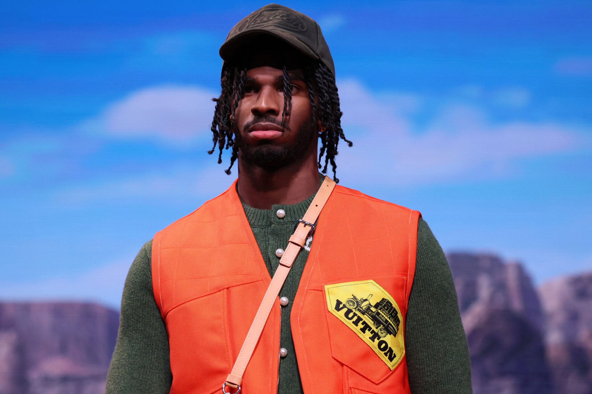 Shedeur Sanders, the son of US football star Deion Sanders, presents a creation for the Louis Vuitton Menswear Ready-to-wear Fall-Winter 2024/2025 collection as part of the Paris Fashion Week, in Paris on January 16, 2024. (Photo by ALAIN JOCARD / AFP) (Photo by ALAIN JOCARD/AFP via Getty Images)