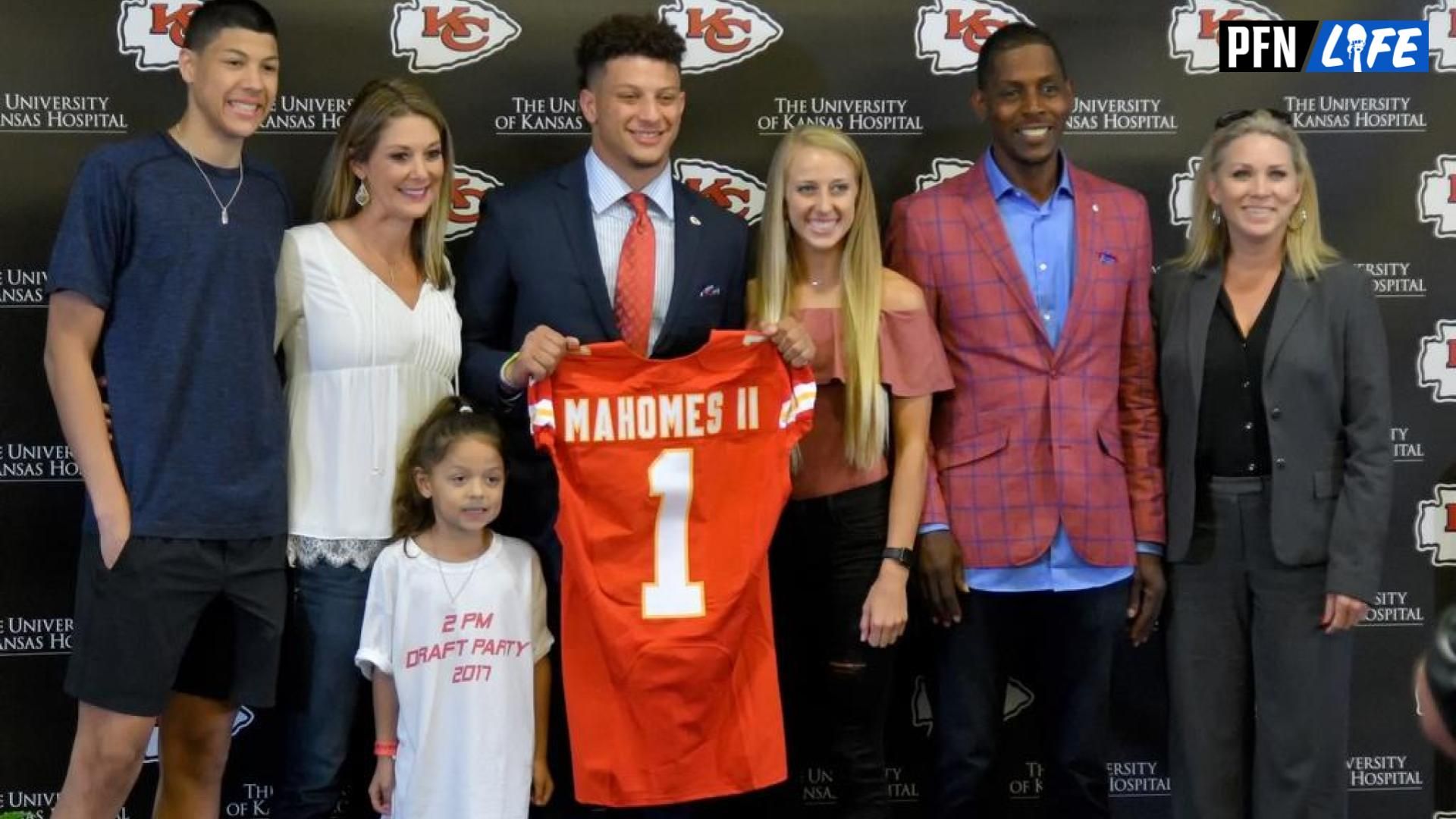 Kansas City Chiefs number 10 pick Patrick Mahomes II poses for a photo with his family during the press conference at Stram Theatre.