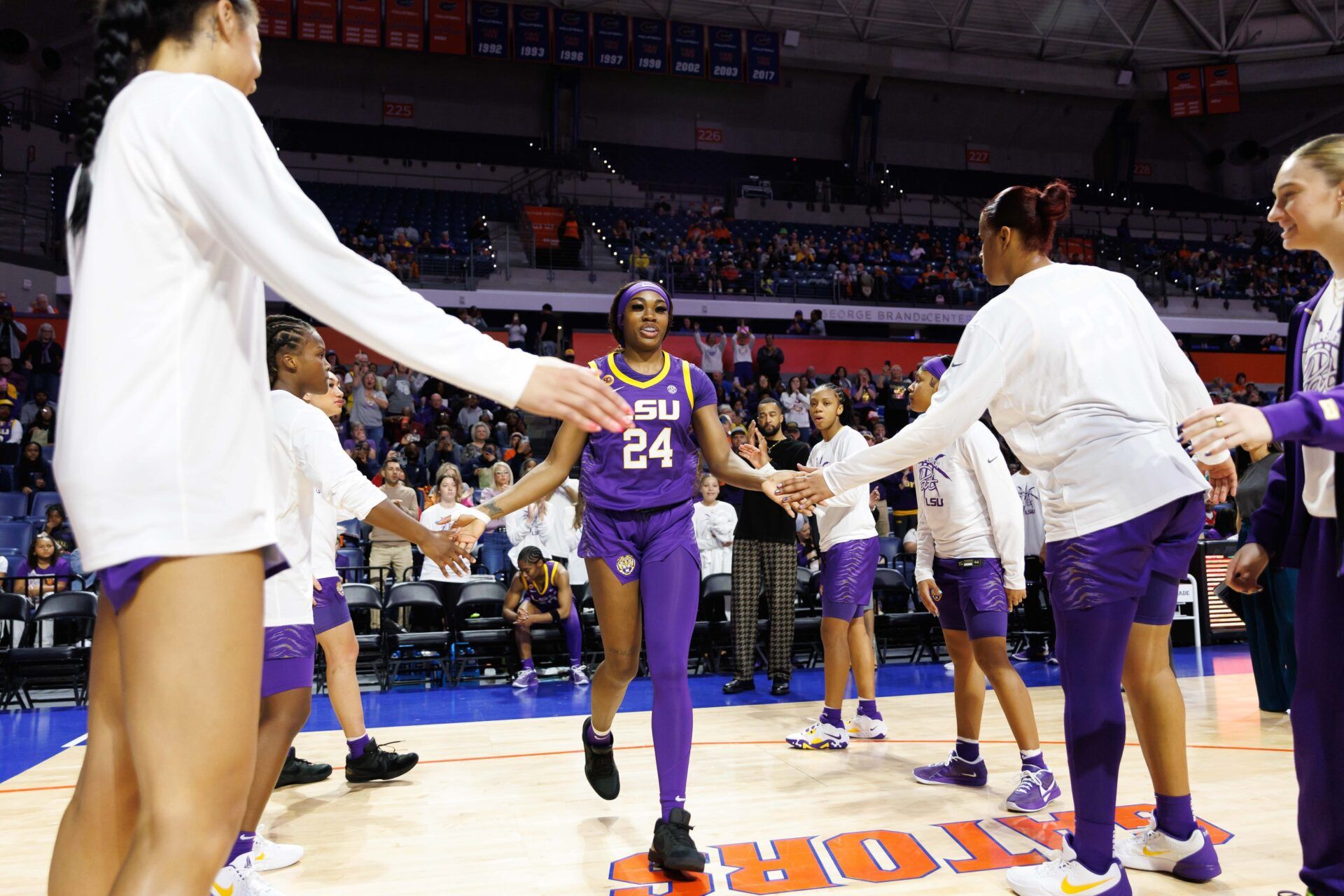 LSU Tigers guard Aneesah Morrow (24) shakes hands while being introduced before a game against the Florida Gators at Exactech Arena at the Stephen C. O'Connell Center.
